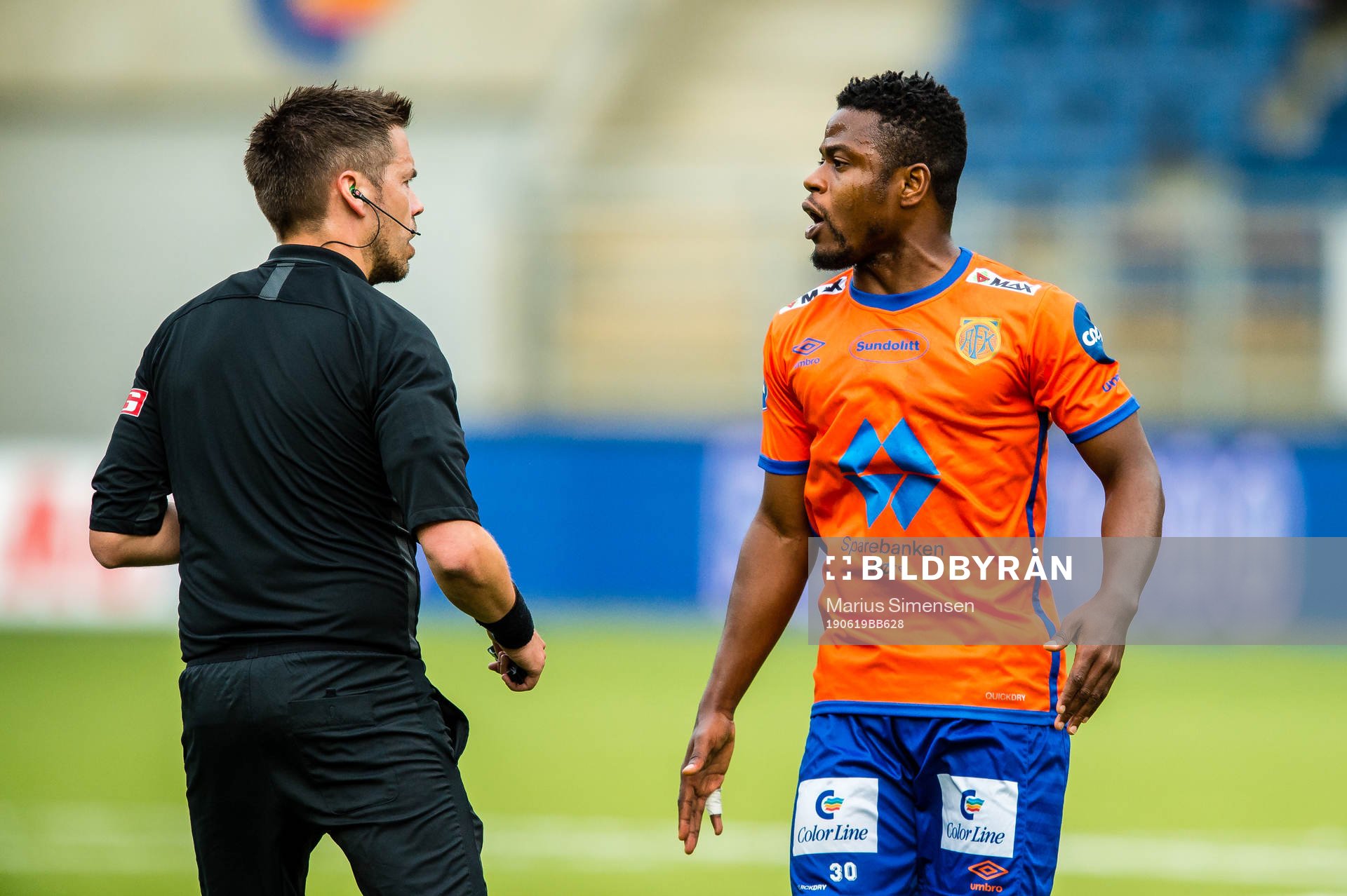 Tom Harald Hagen, referee, and Izunna Arnest Uzochukwu of