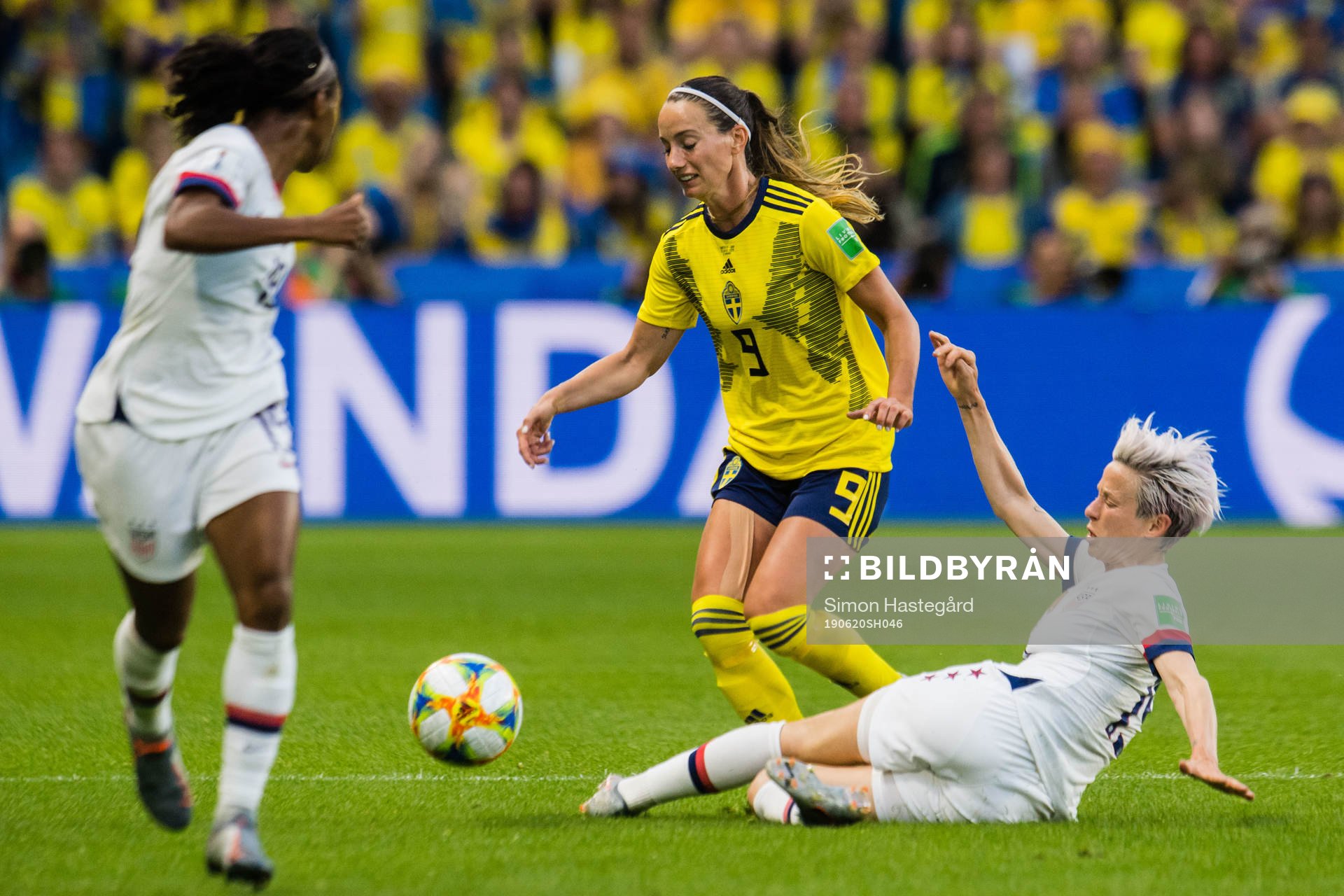 Kosovare Asllani of Sweden and Megan Rapinoe of USA