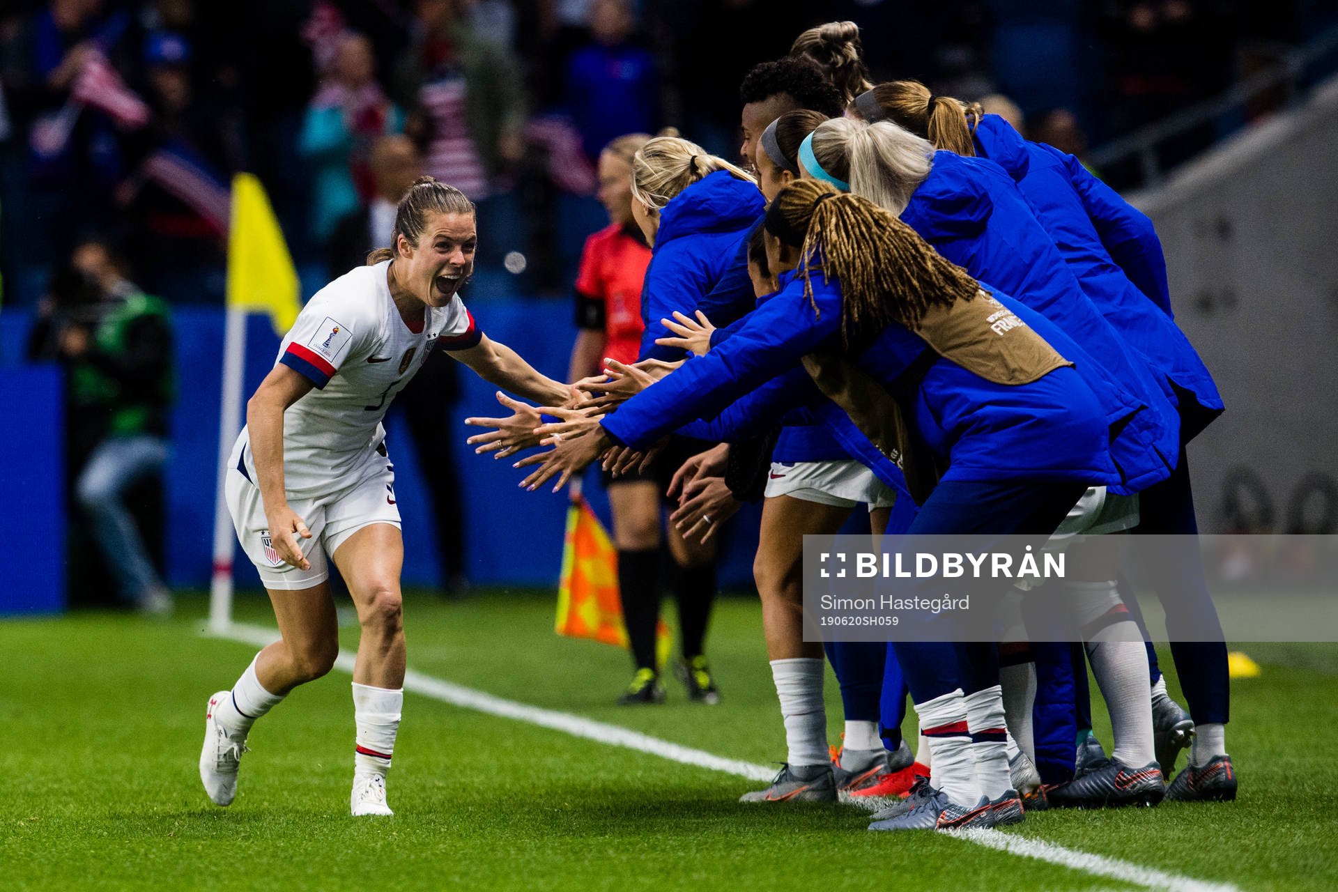 Kelley O'Hara of USA celebrates
