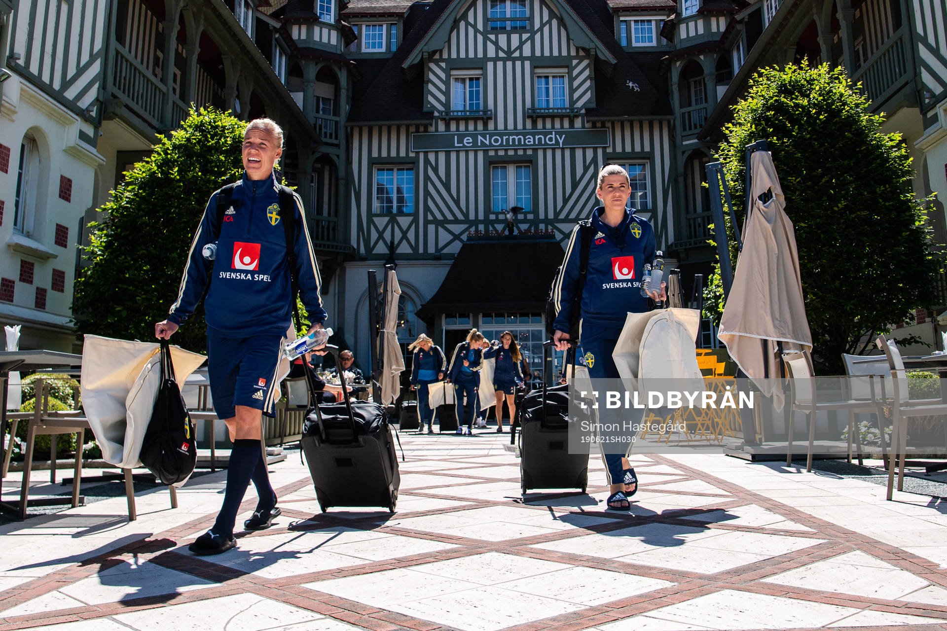 Caroline Seger and Olivia Schough of Sweden leave the team