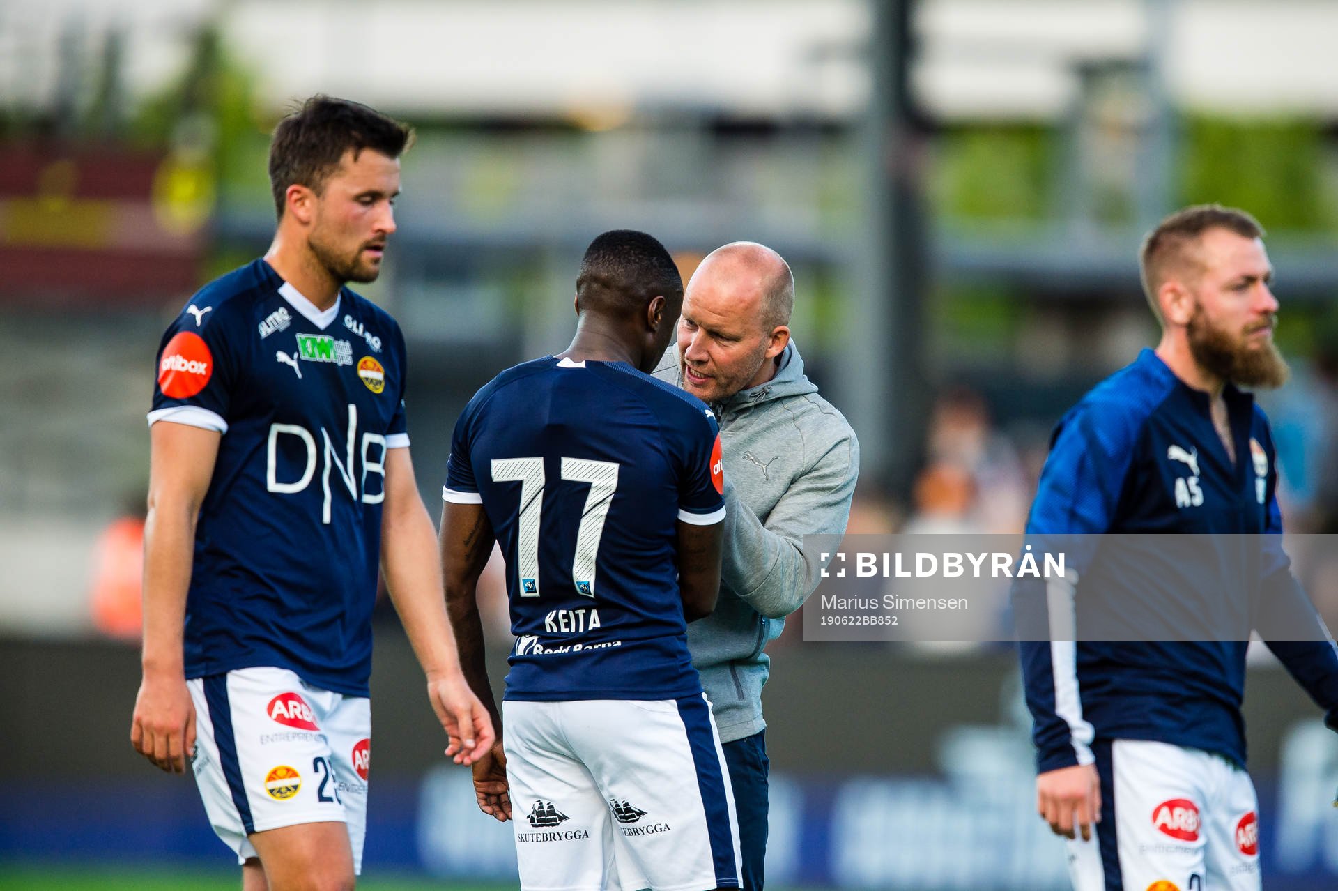 Muhamed Maudo Keita of Strømsgodset and Henrik Pedersen,
