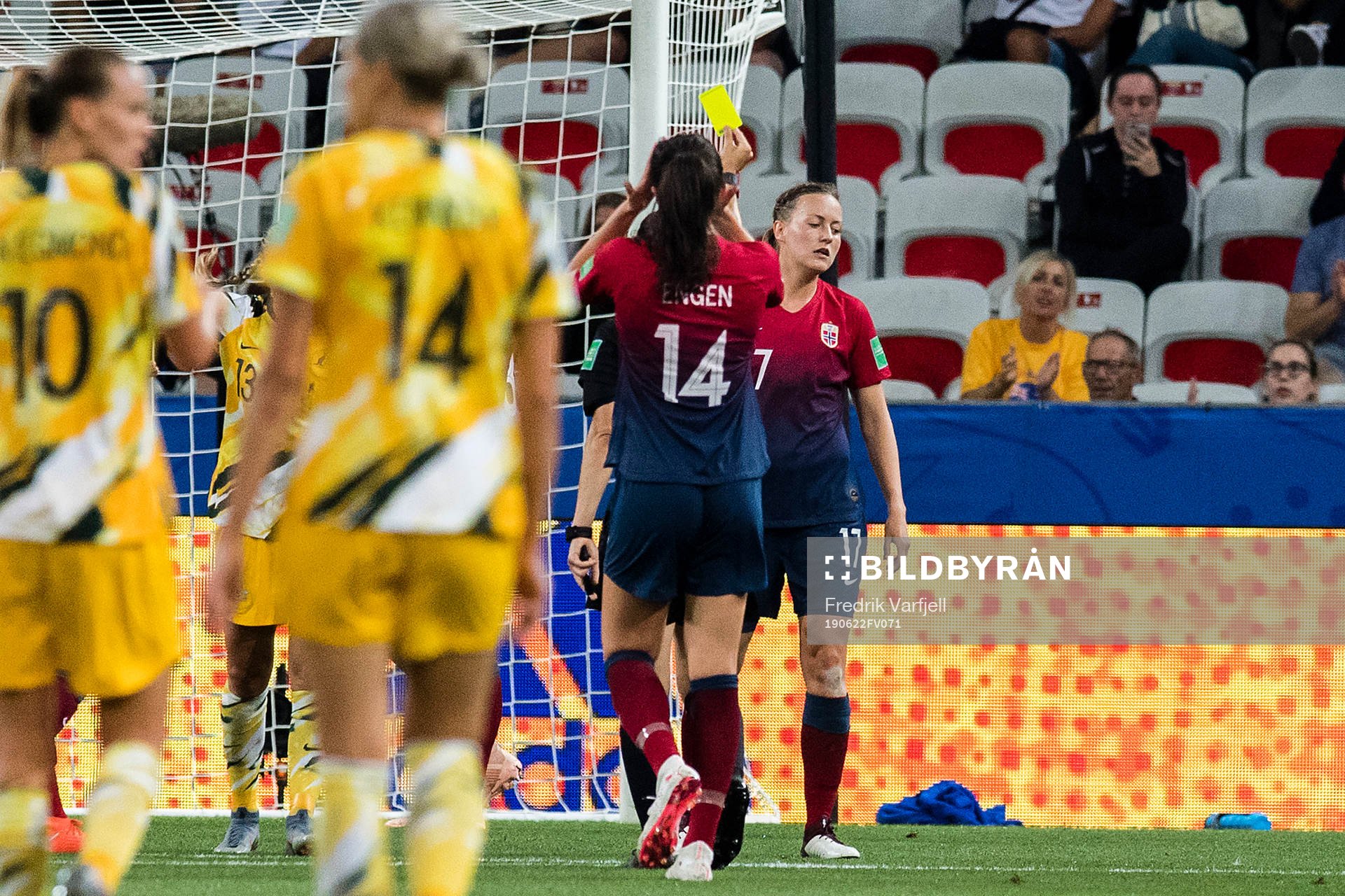 Kristine Minde of Norway gets a yellow card