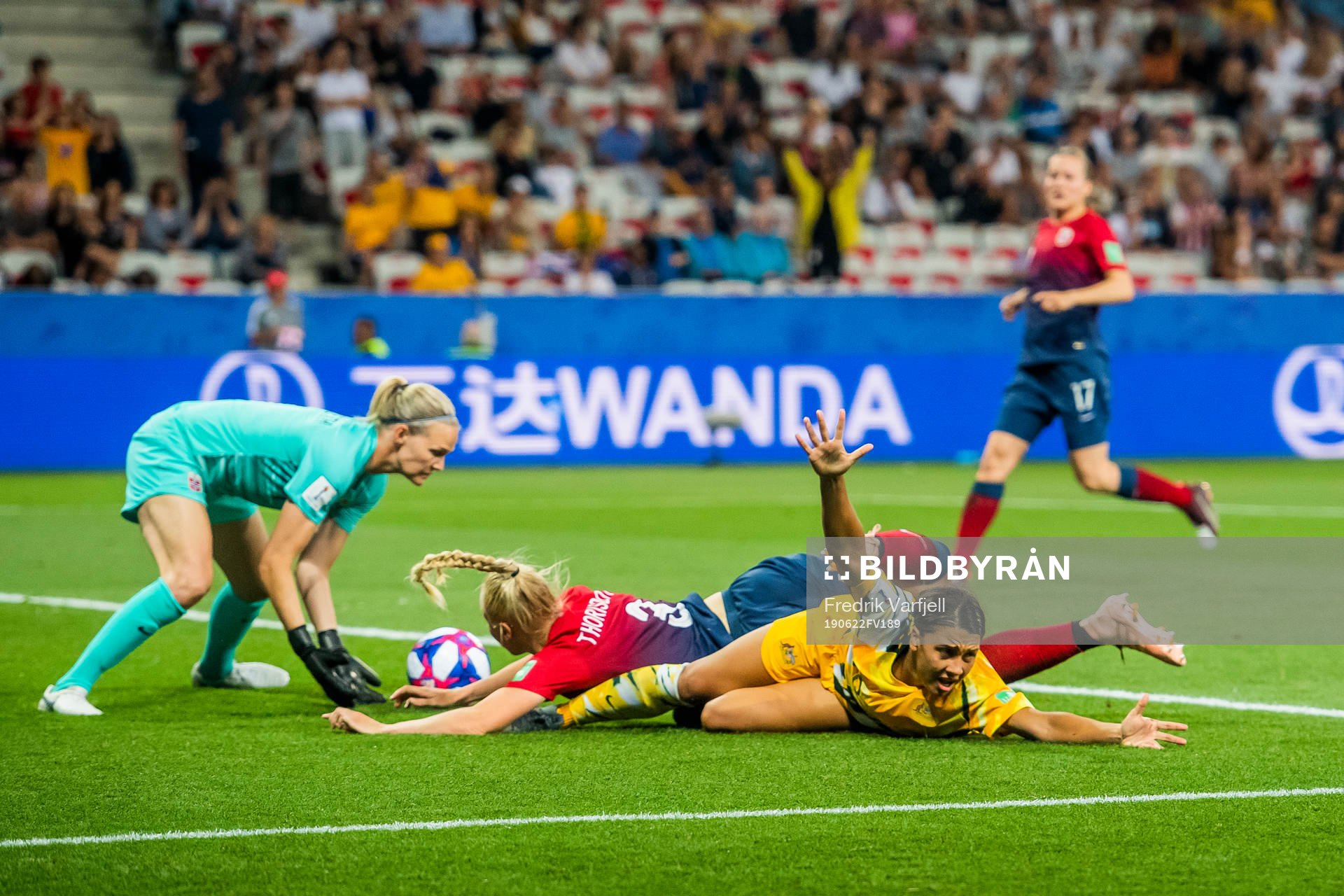 Sam Kerr of Australia reacts next to goalkeeper Ingrid