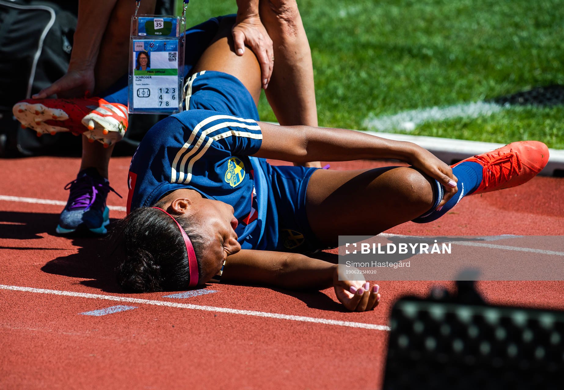 Madelen Janogy of Sweden receives treatment