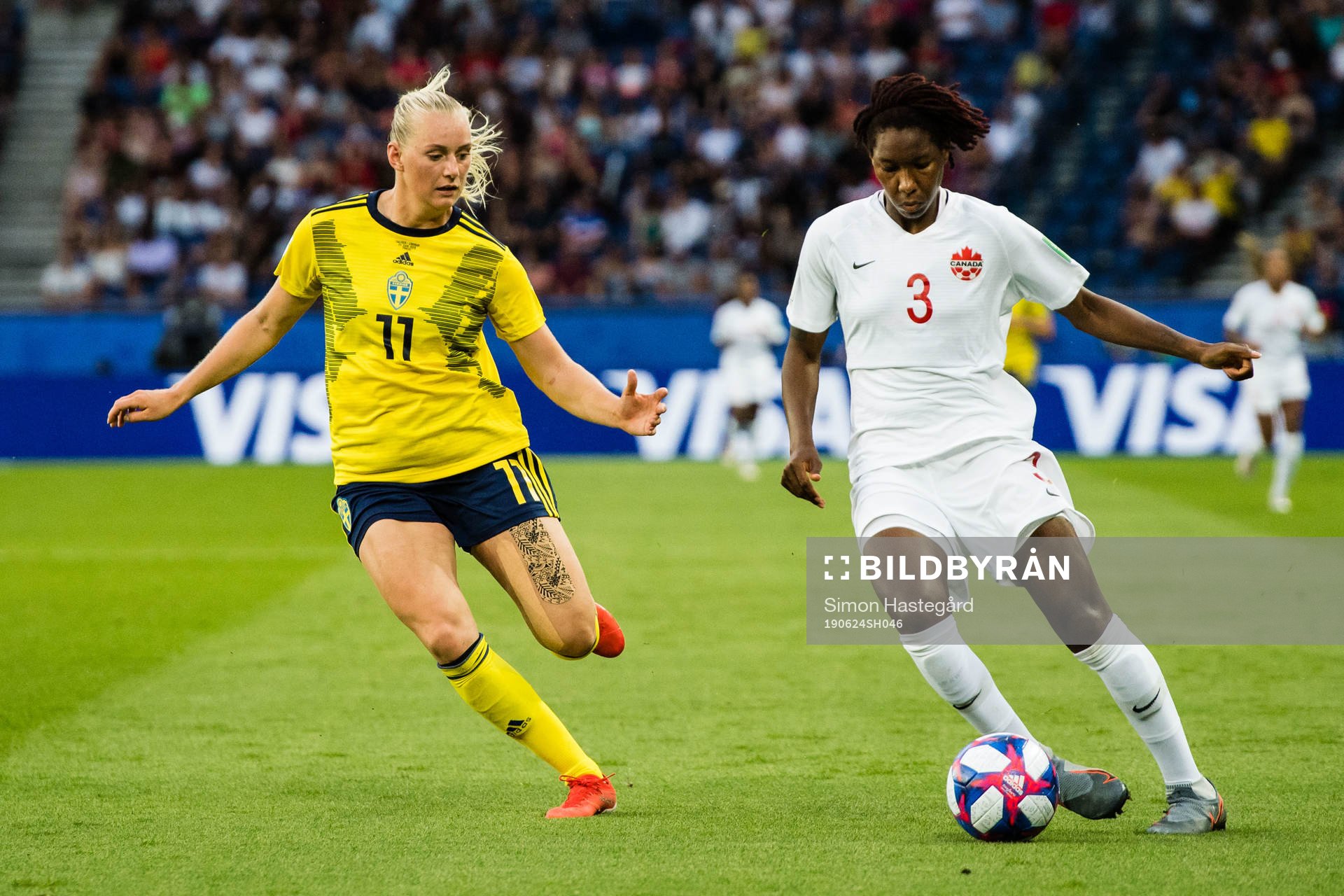 Stina Blackstenius of Sweden and Kadeisha Buchanan of Canada