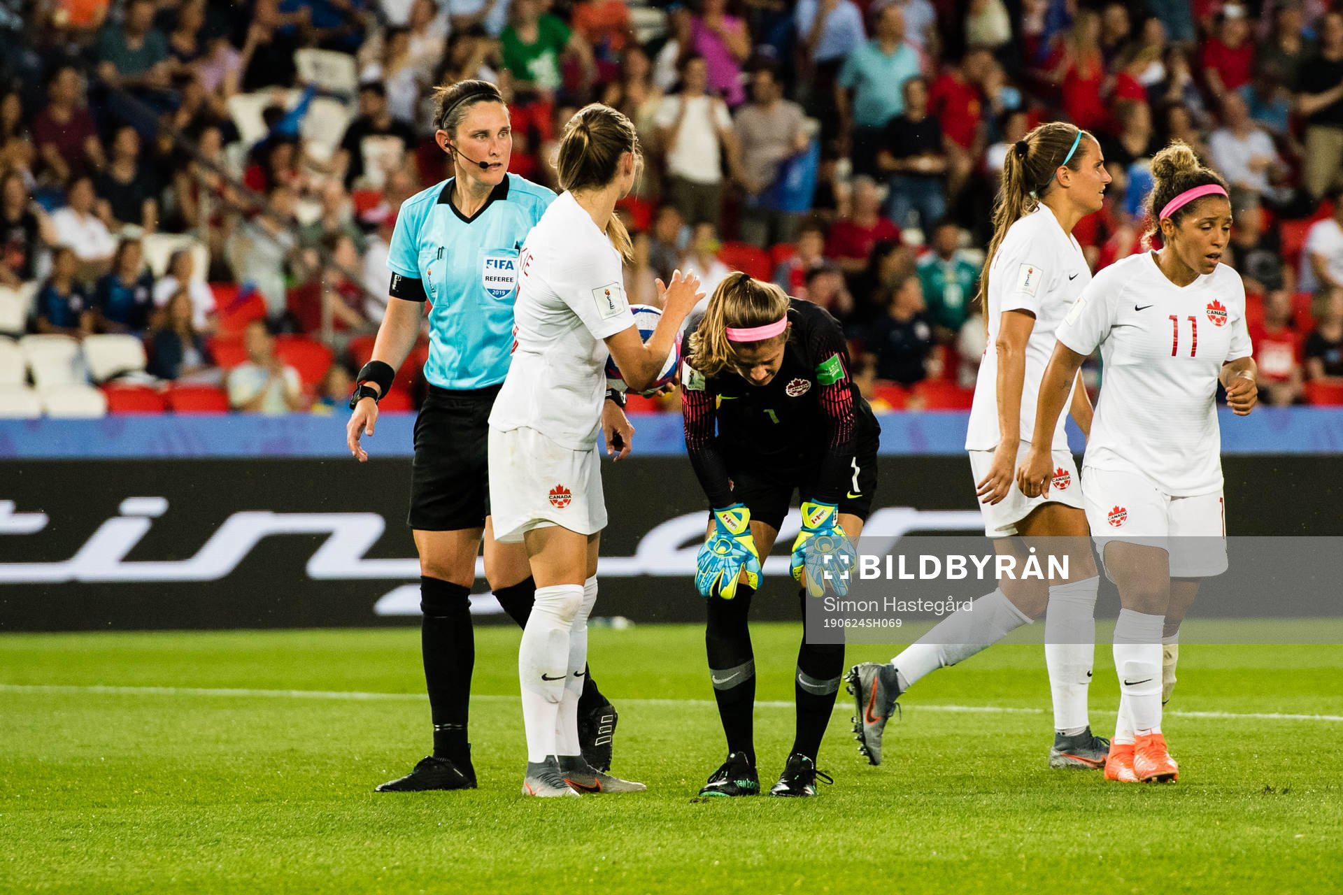 Goalkeeper Stephanie Labbe of Canada looks dejected