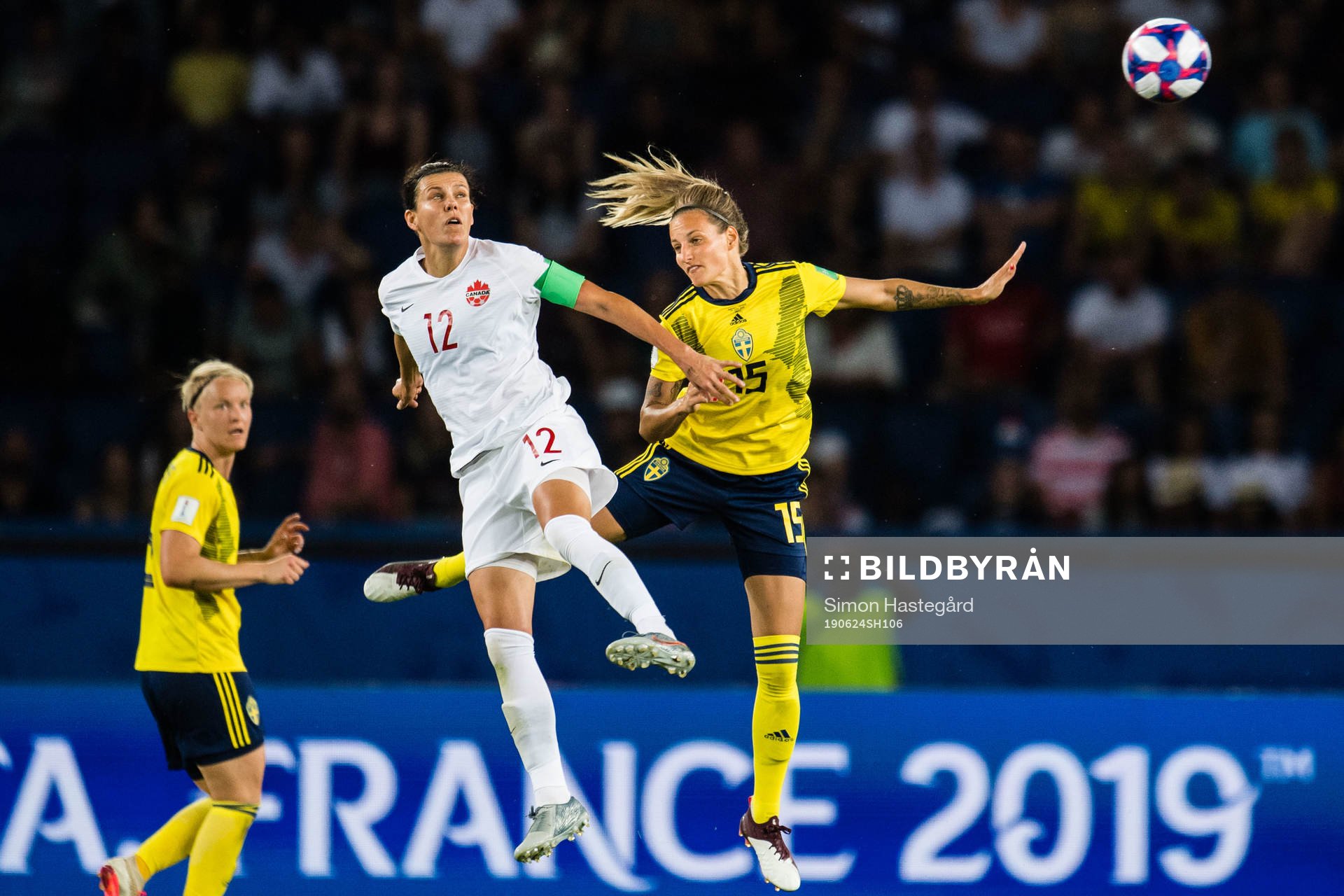Christine Sinclair of Canada and Nathalie Björn of Sweden