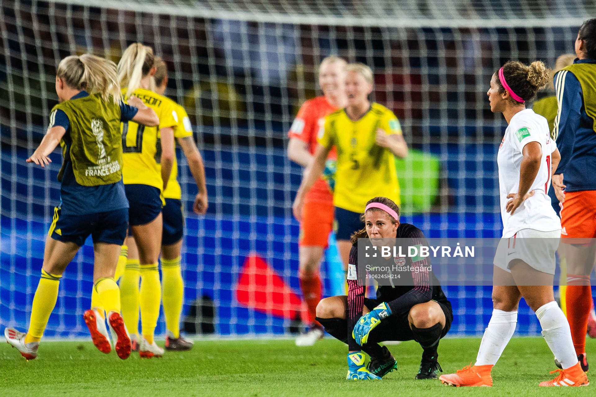 Goalkeeper Stephanie Labbe of Canada looks dejected