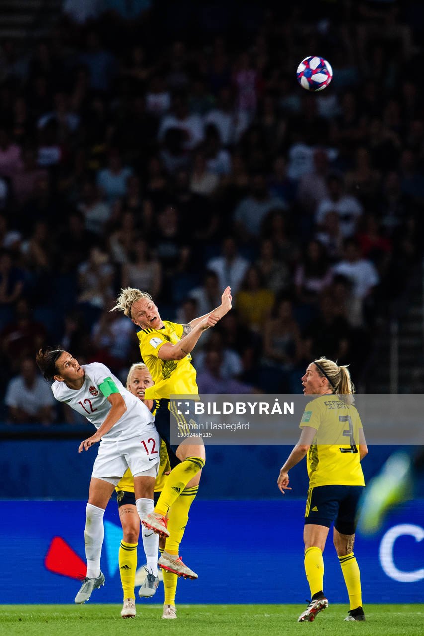 Christine Sinclair of Canada and Nilla Fischer of Sweden