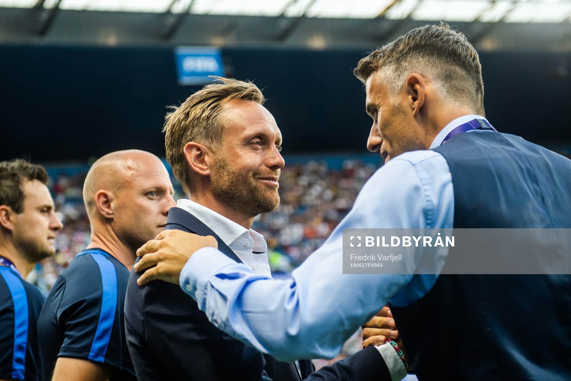 Martin Sjögren, head coach of Norway, and Phil Neville,
