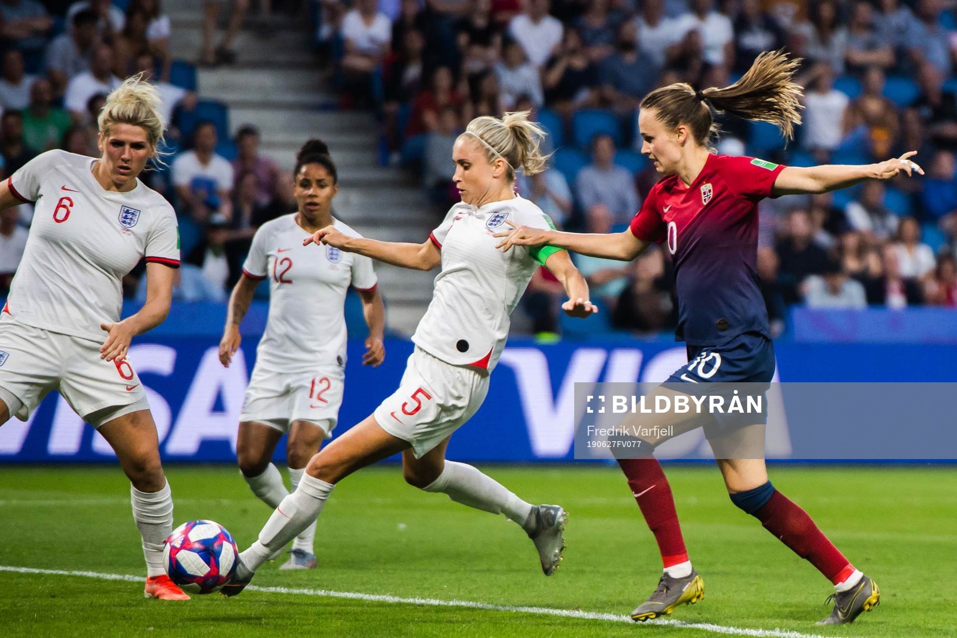 Steph Houghton of England and Caroline Graham Hansen of