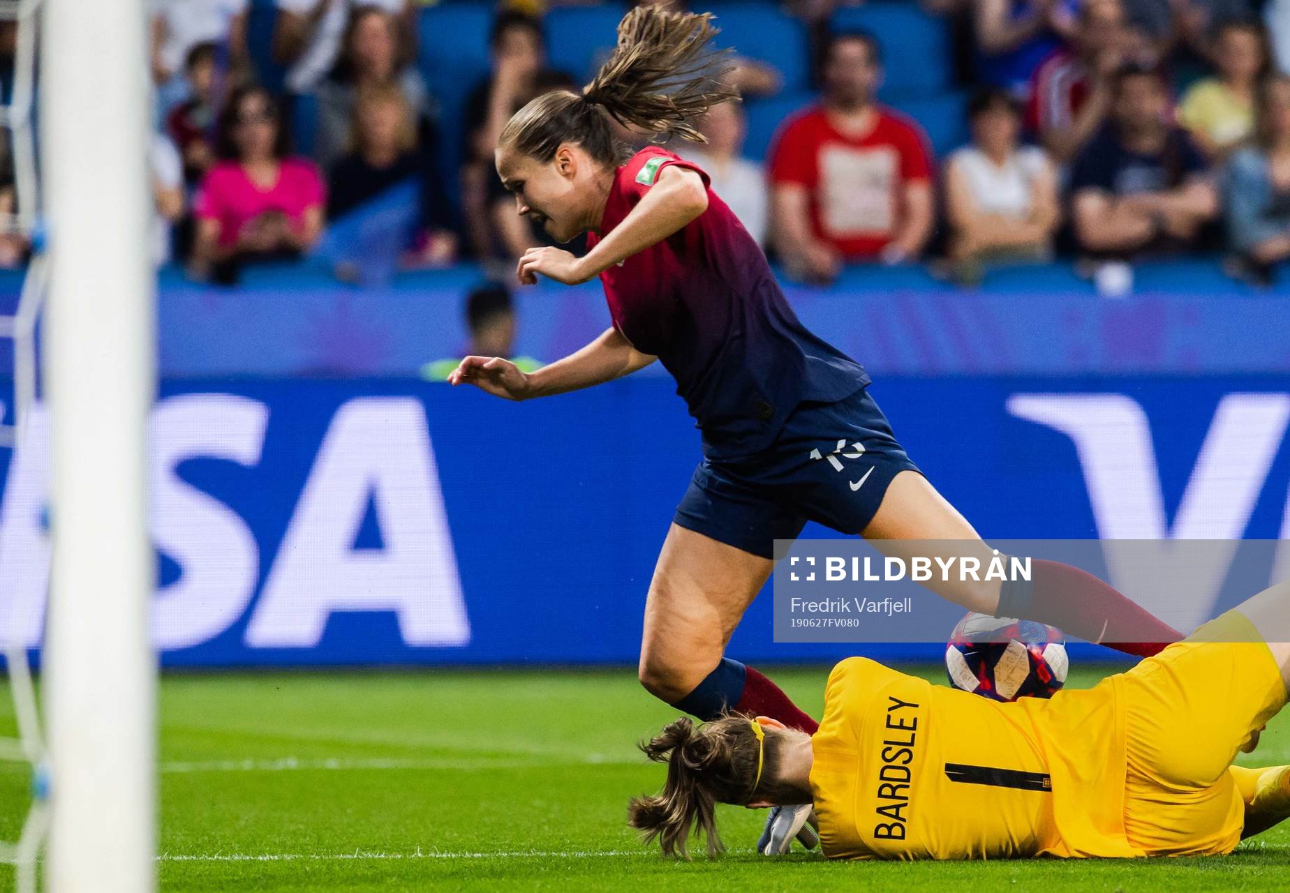 Guro Reiten of Norway and goalkeeper Karen Bardsley of