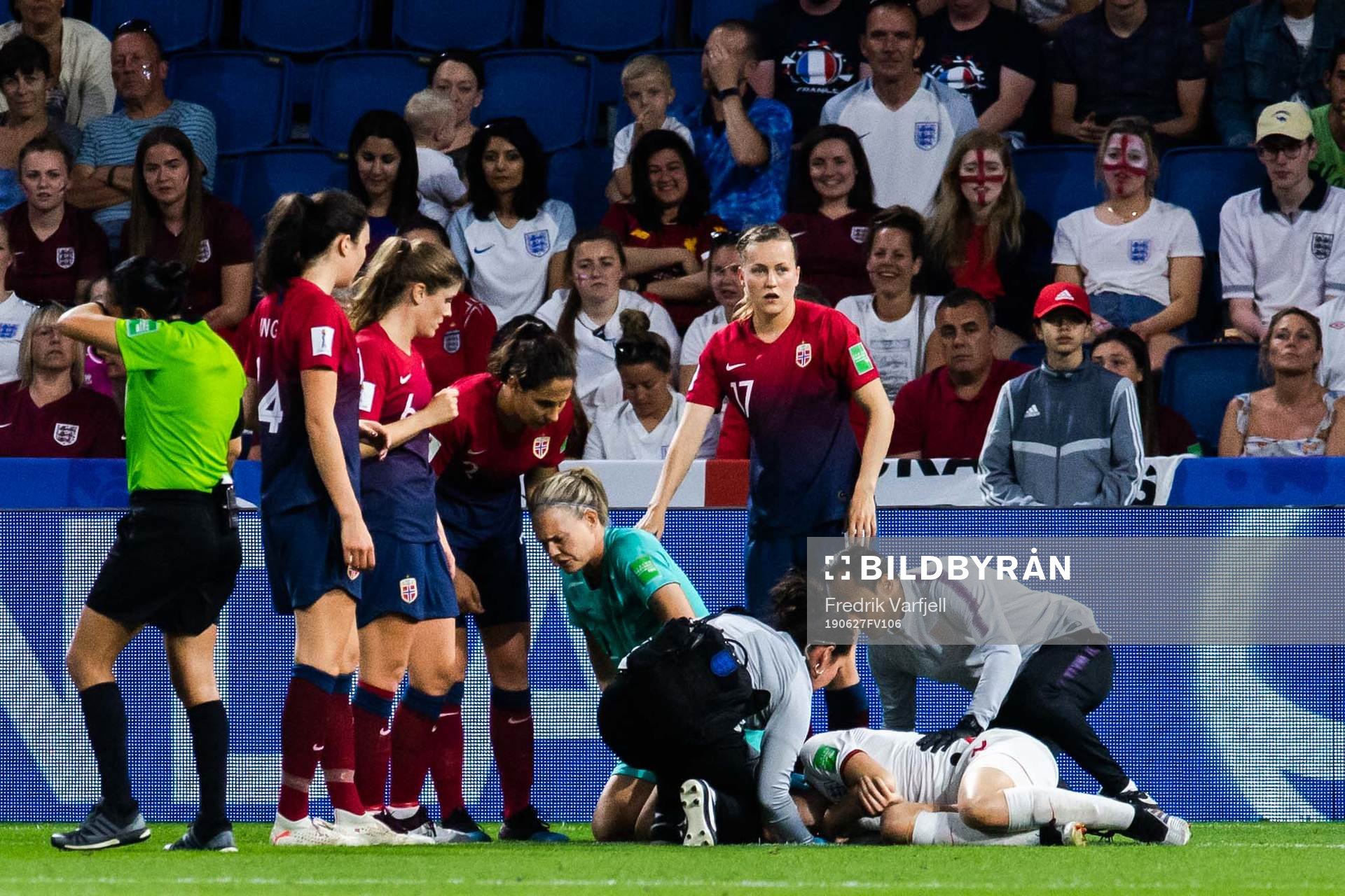 Goalkeeper Ingrid Hjelmseth of Norway receives medical