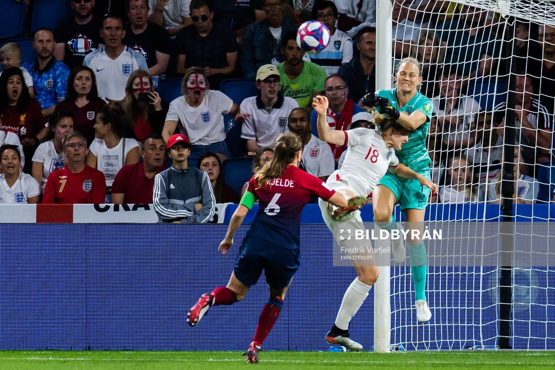 Ellen White of England and goalkeeper Ingrid Hjelmseth of