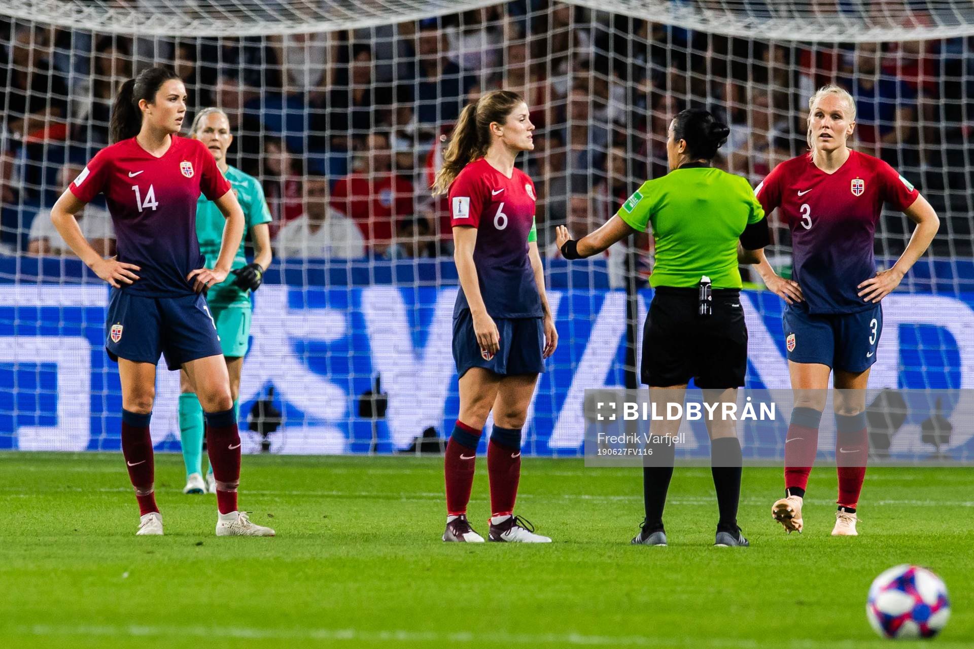 Maren Nævdal Mjelde of Norway in a discussion with referee