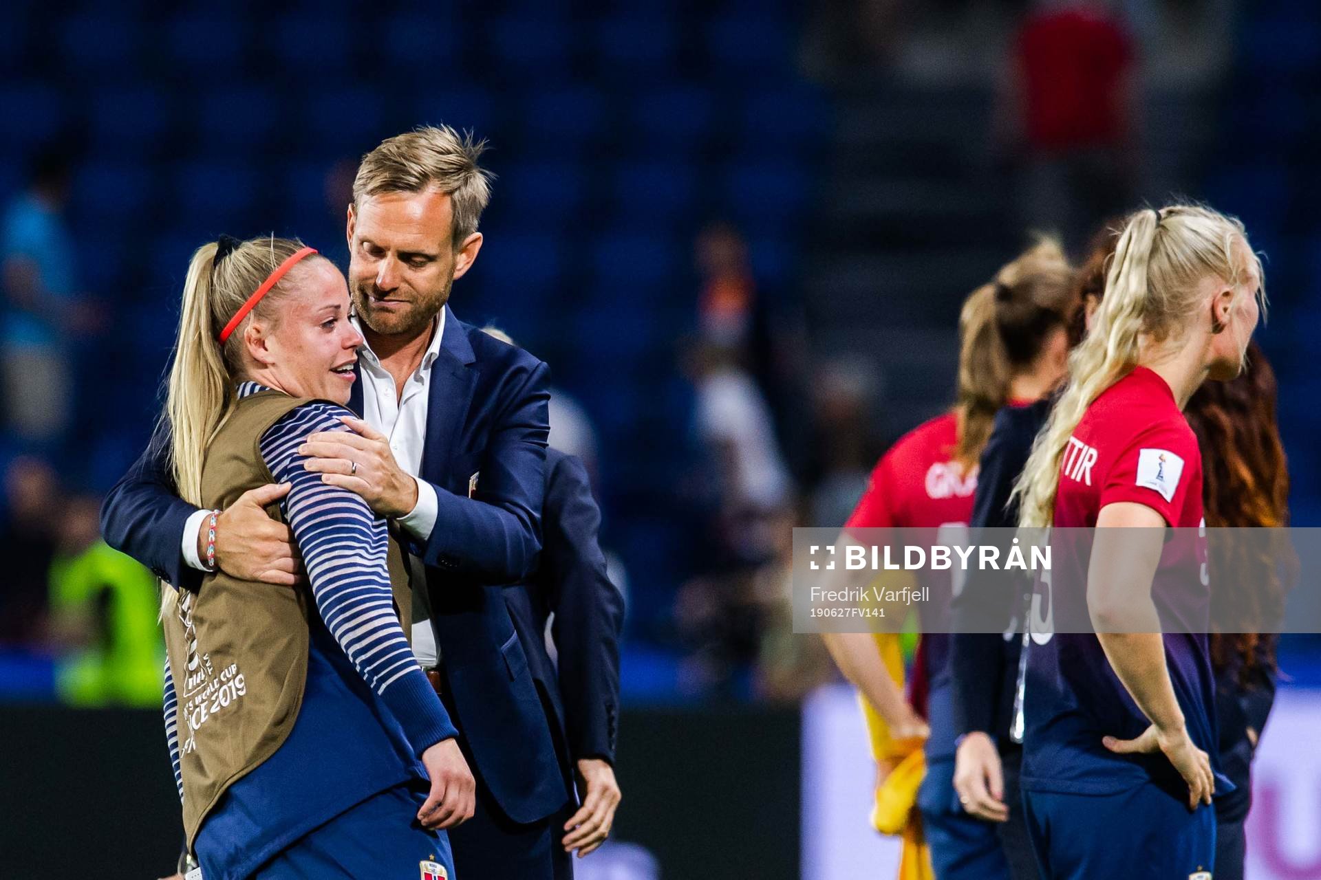 Therese Sessy Åsland and Martin Sjögren, head coach of