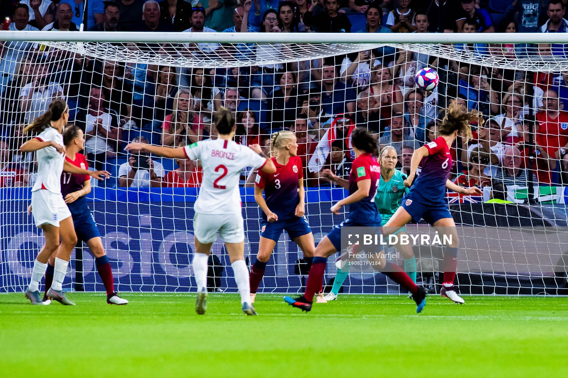 Lucy Bronze of England scores 0-3 behind Kristine Minde,