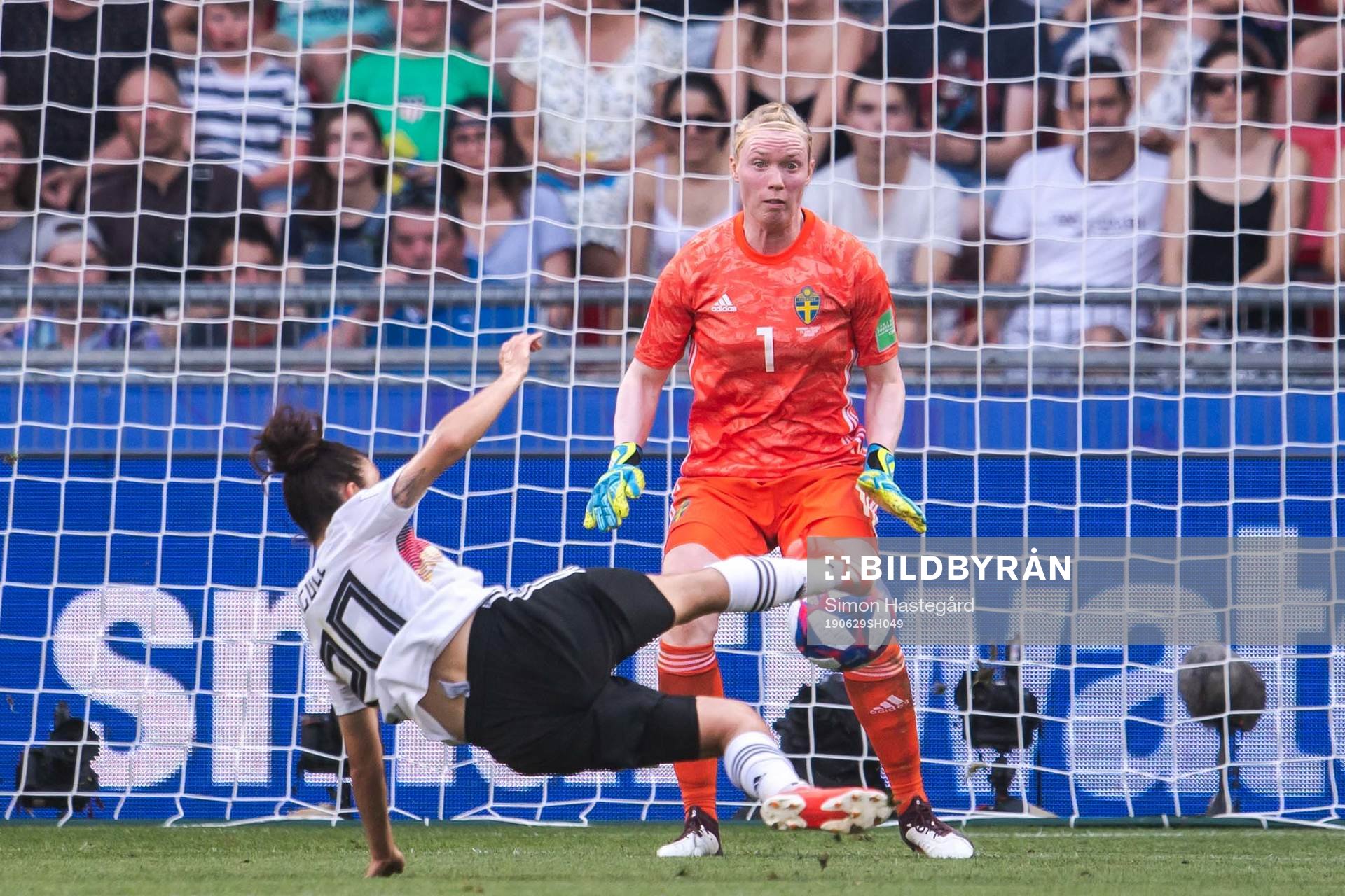 Lina Magull of Germany scores 1-0 behind goalkeeper Hedvig