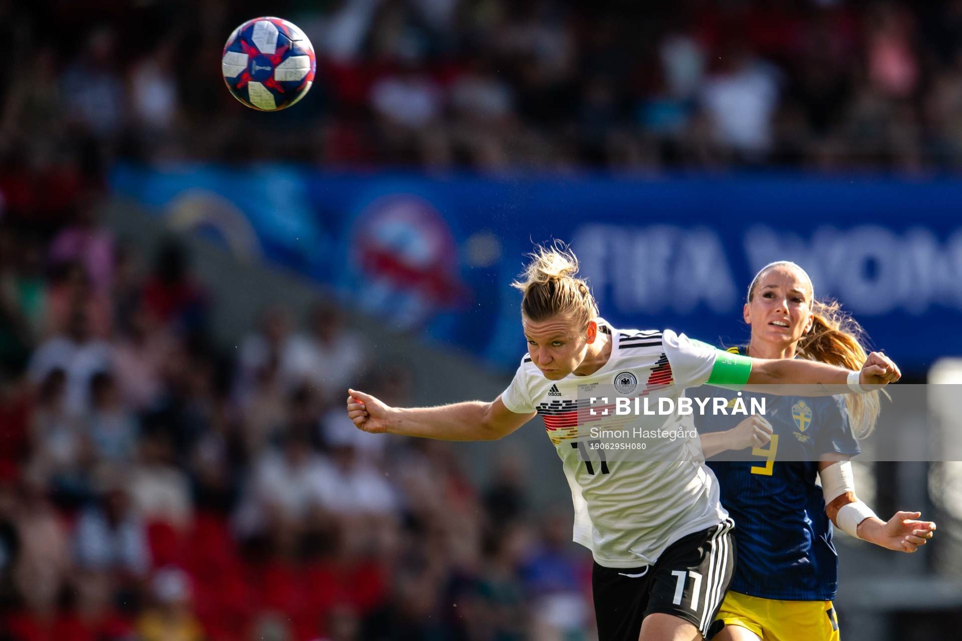 Alexandra Popp of Germany and Kosovare Asllani of Sweden