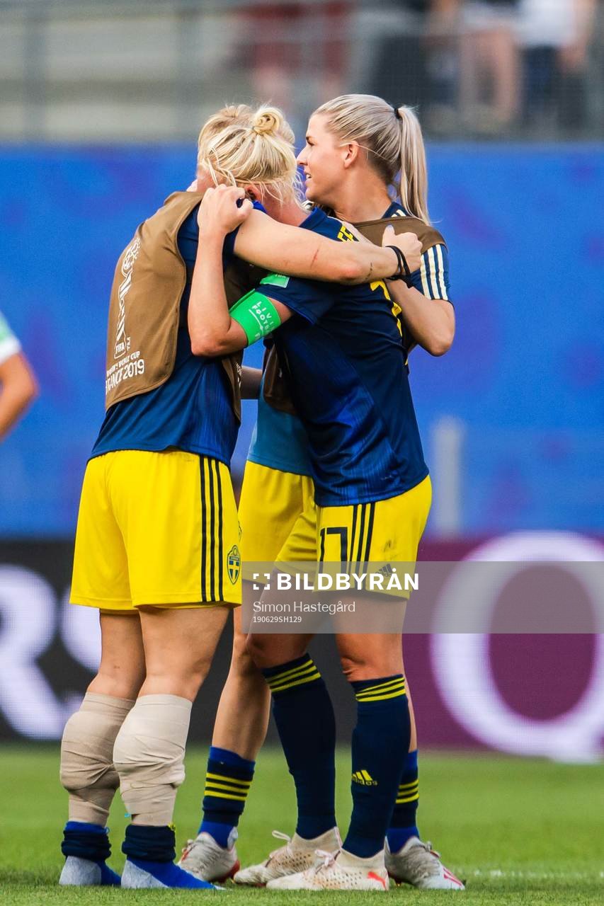 Nilla Fischer and Caroline Seger of Sweden celebrate