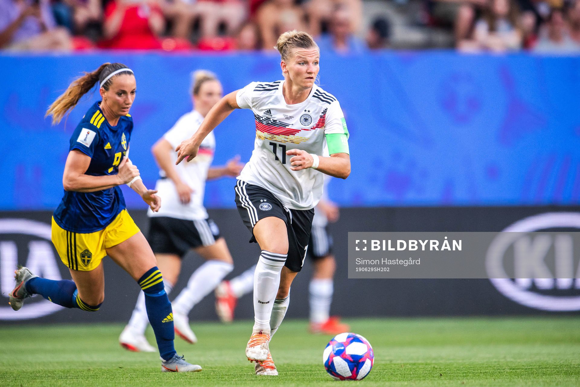 Kosovare Asllani of Sweden and Alexandra Popp of Germany
