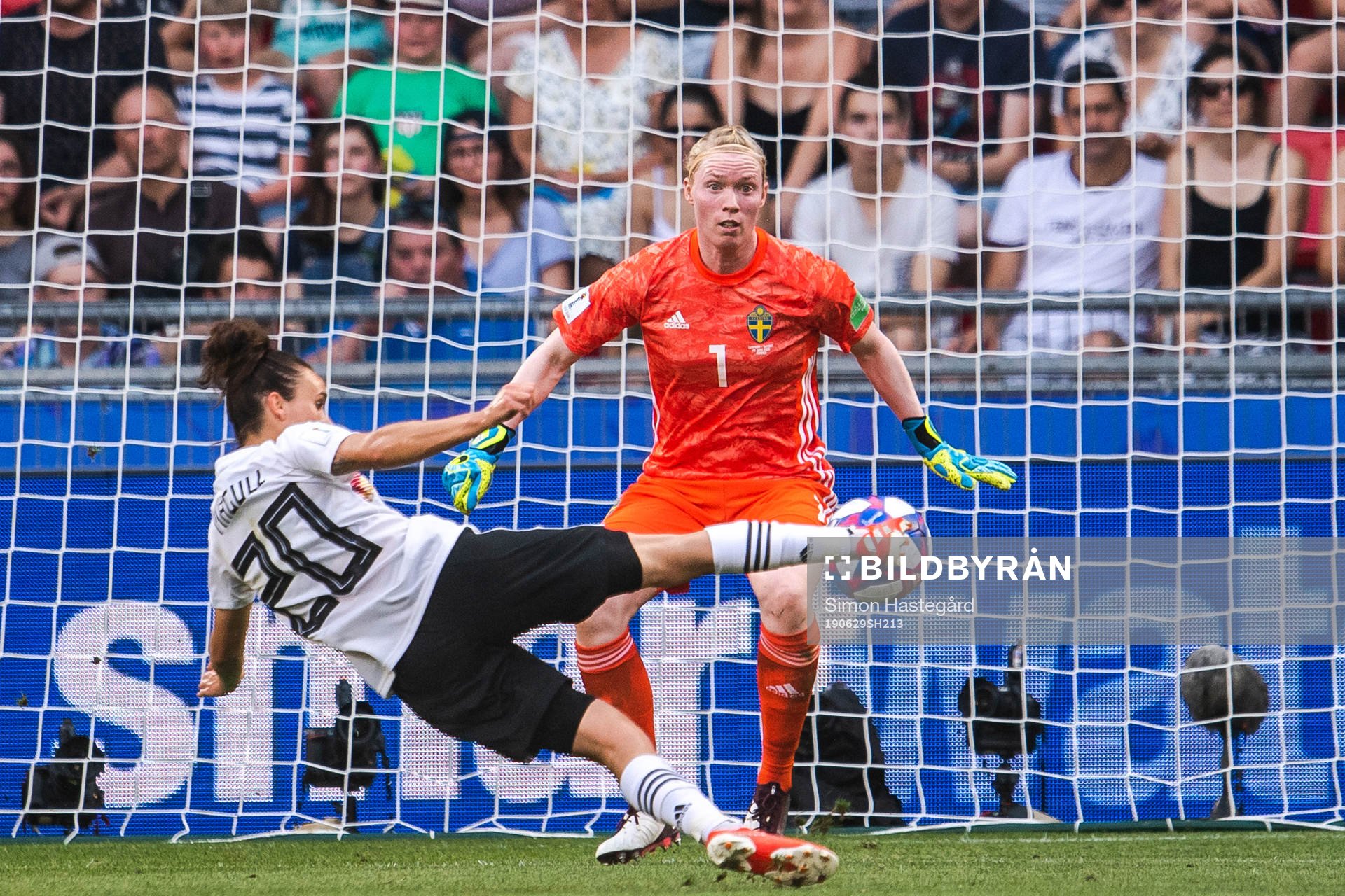 Lina Magull of Germany scores the 1-0 goal behind