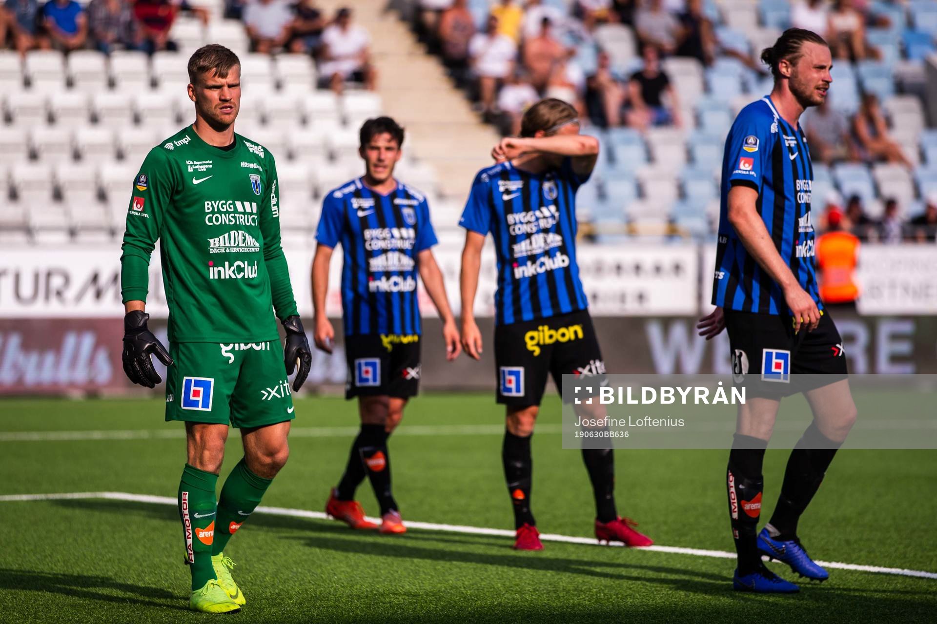 Sirius Daniel Jarl, målvakt Lukas Jonsson och Tim Björkström under fotbollsmatchen i Allsvenskan mellan IFK Norrköping och Sirius den 30 juni 2019 i Norrköping.