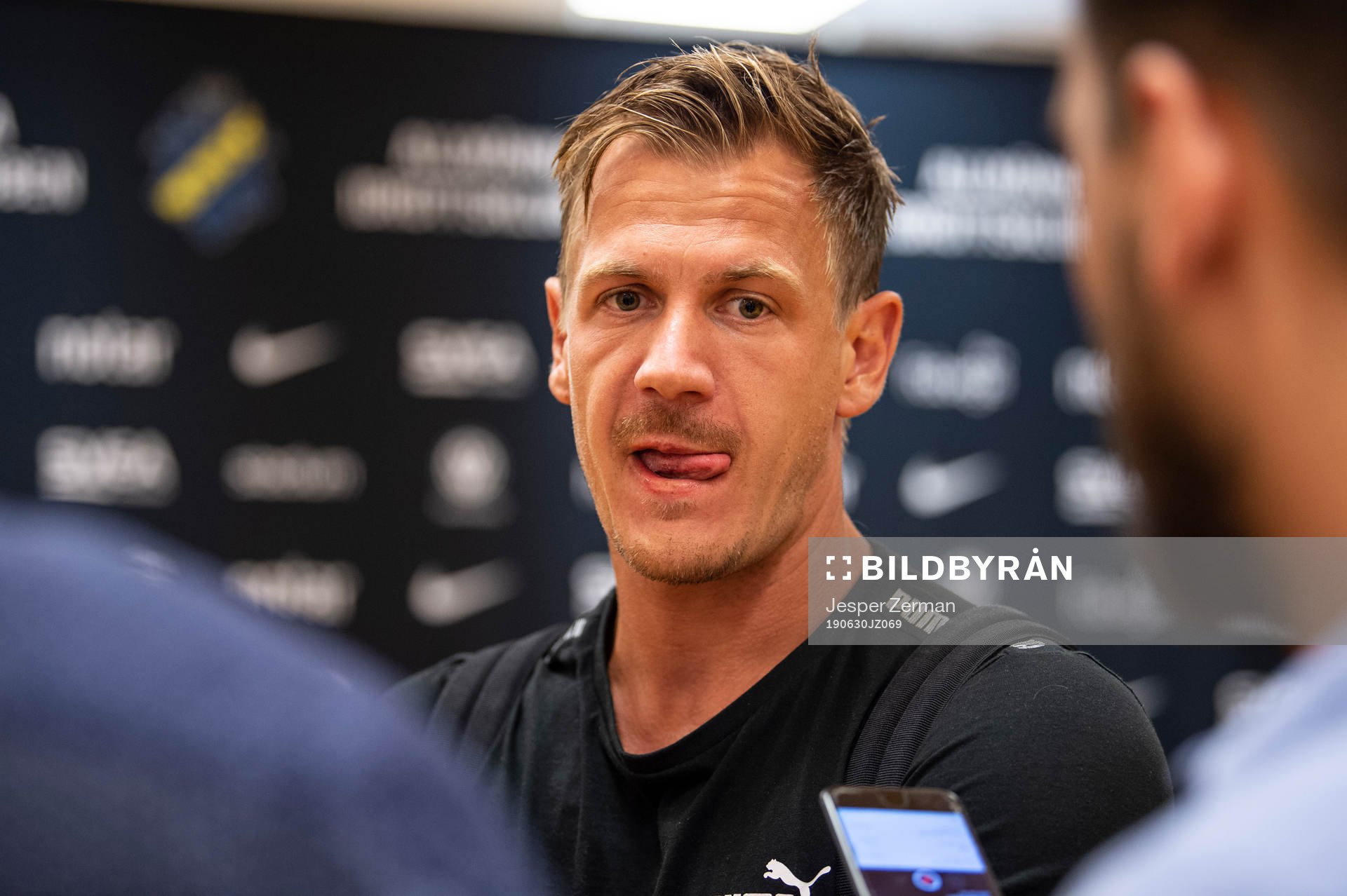 Malmö FFs Johan Dahlin intervjuas i mixed zone efter fotbollsmatchen i Allsvenskan mellan AIK och Malmö FF den 30 juni 2019 i Stockholm.