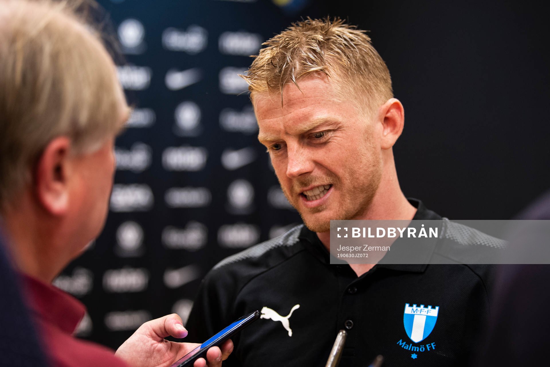 Malmö FFs Anders Christiansen intervjuas i mixed zone efter fotbollsmatchen i Allsvenskan mellan AIK och Malmö FF den 30 juni 2019 i Stockholm.