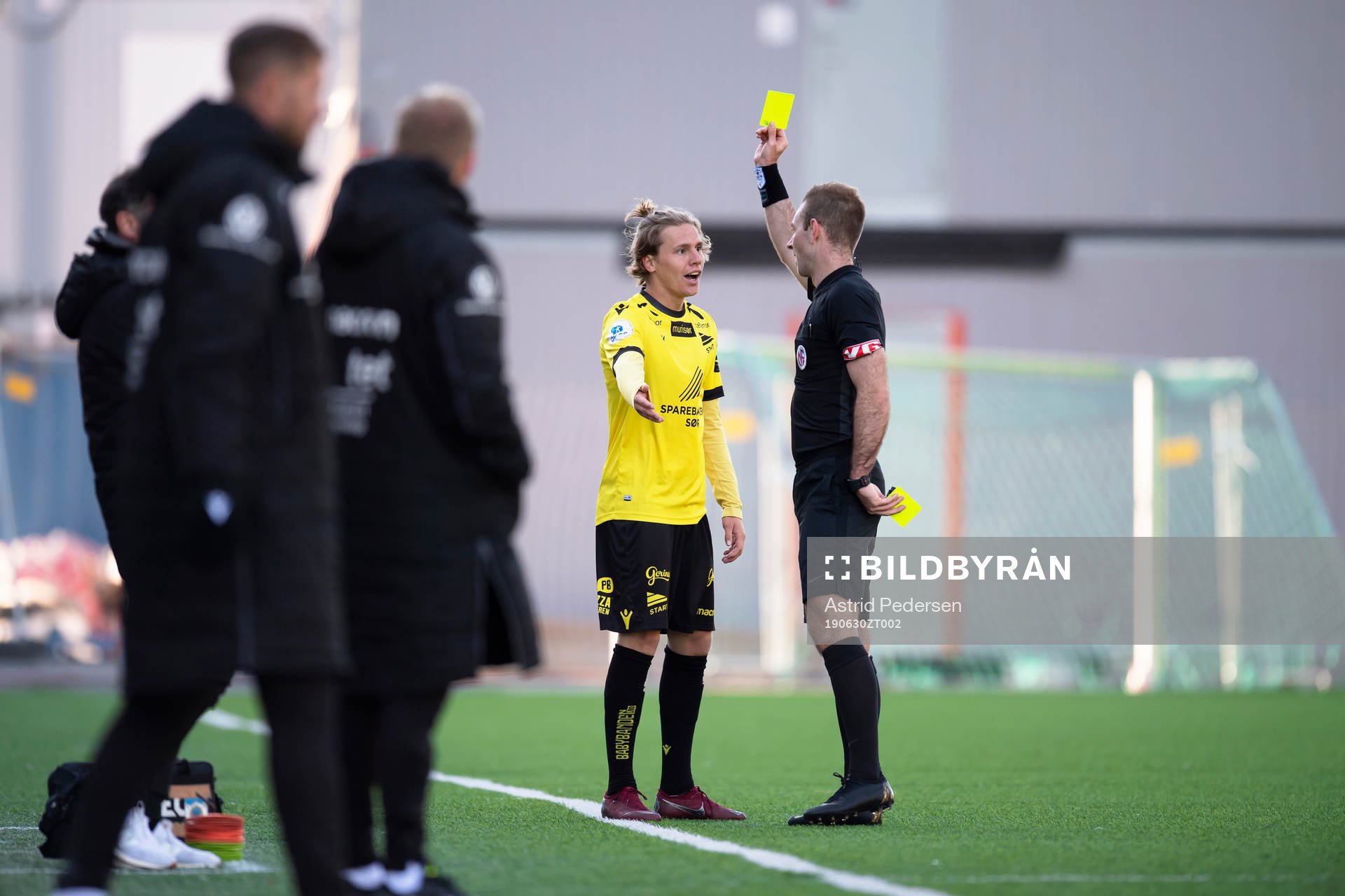 Mikael Birk Giæver Ugland of Start is shown a yellow card