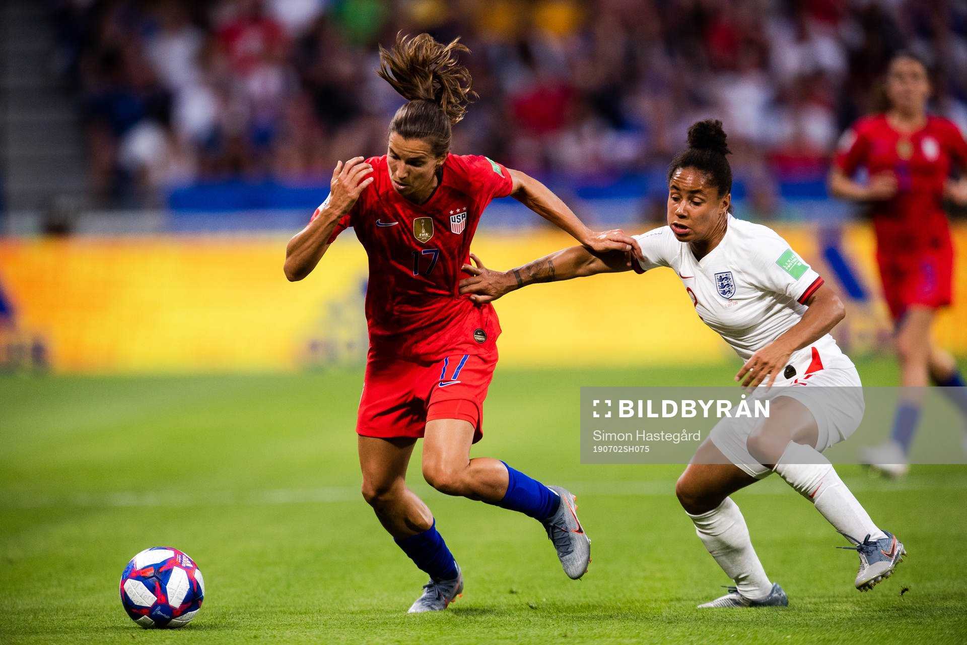Tobin Heath of USA and Lucia Roberta Tough Bronze of England