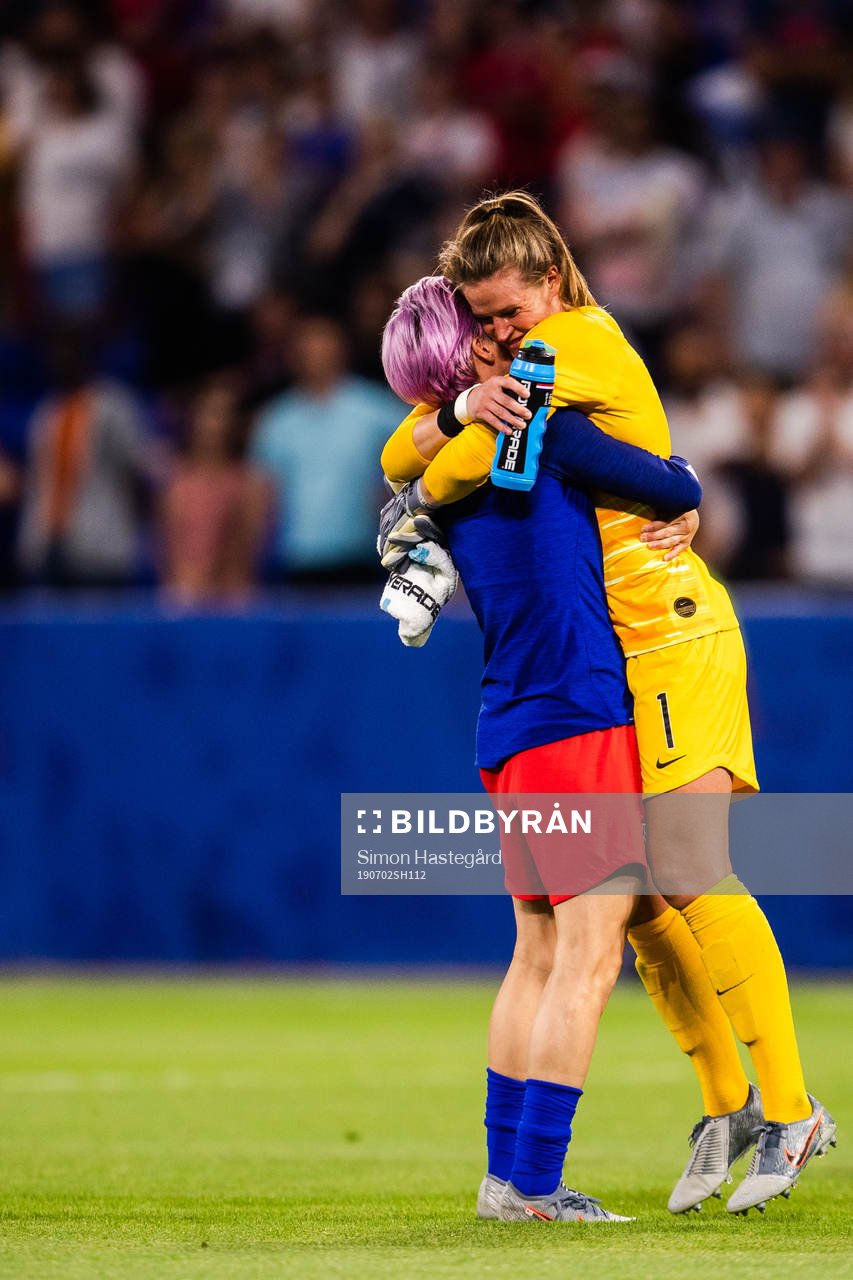 Megan Rapinoe and goalkeeper Alyssa Naeher of USA celebrate
