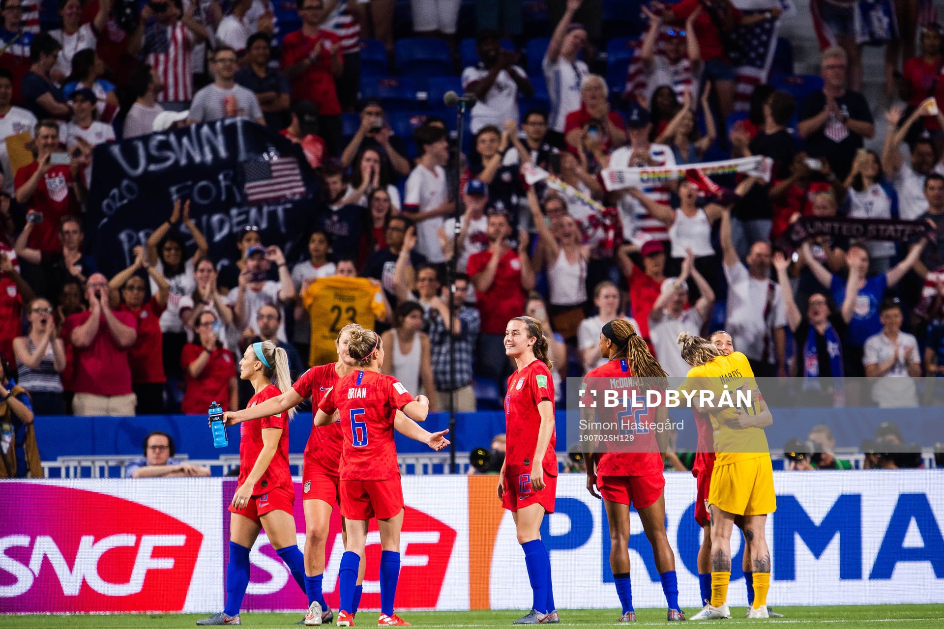 Players and fans of USA celebrate
