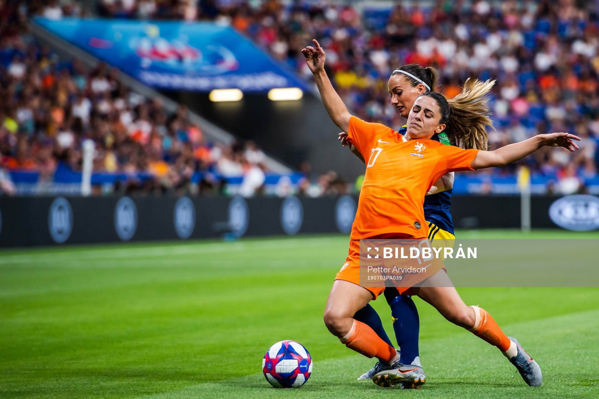 Kosovare Asllani of Sweden and Daniëlle Van De Donk of
