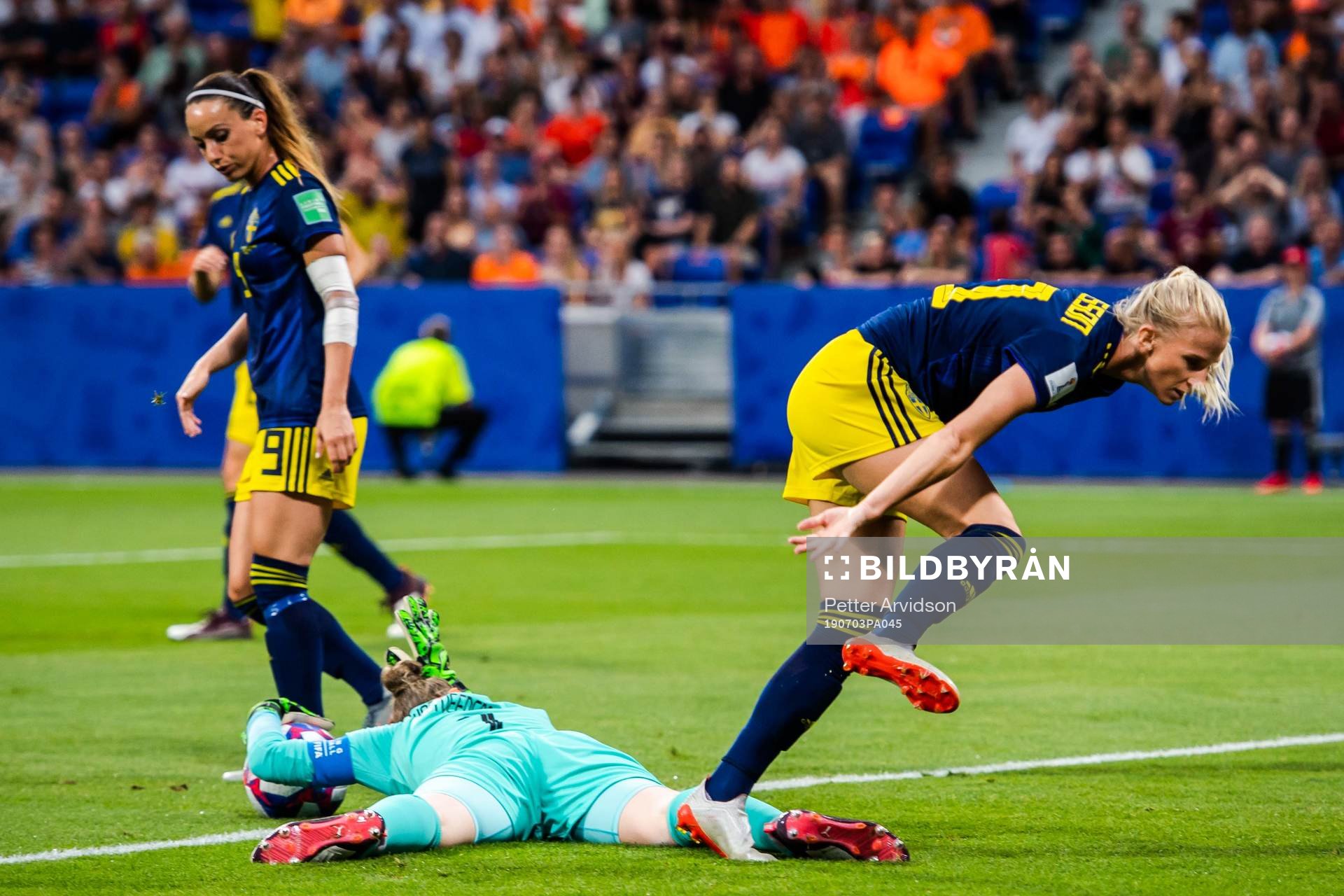 Sofia Jakobsson of Sweden and goalkeeper Sari Van