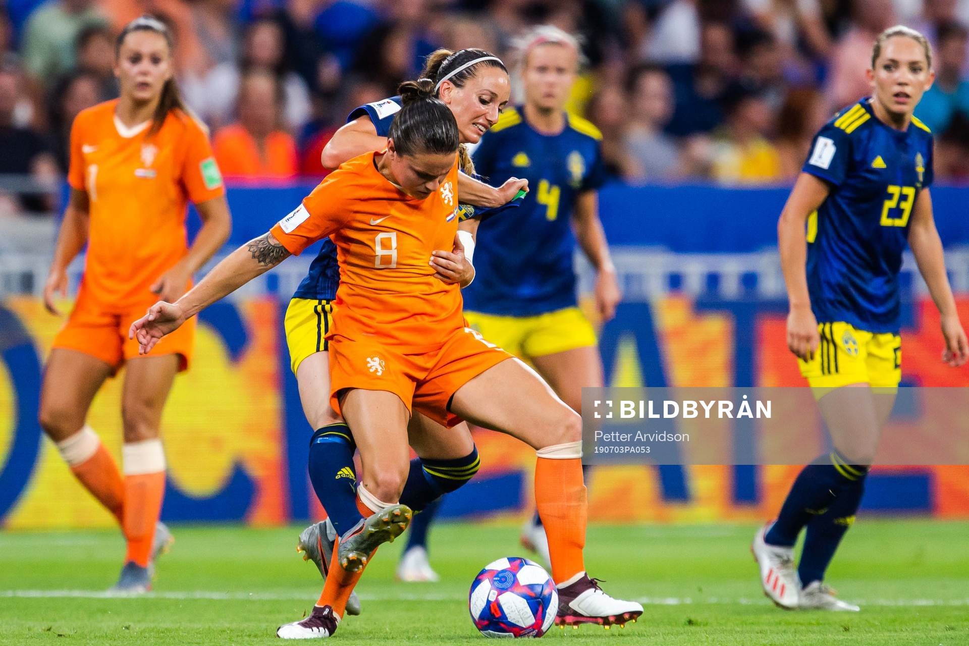 Sherida Spitse of Netherlands and Kosovare Asllani of Sweden