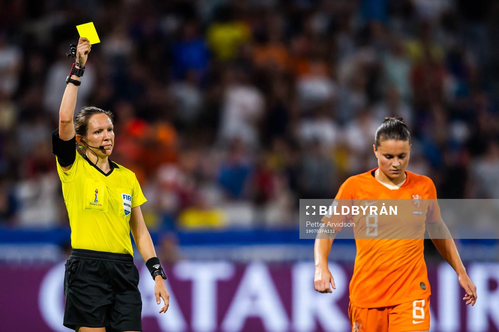 Sherida Spitse of Netherlands is shown a varning by referee
