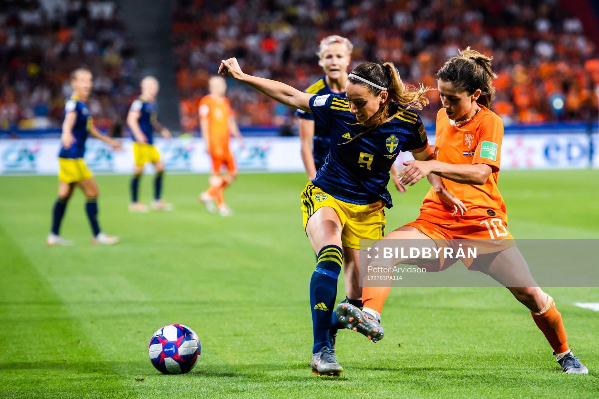 Kosovare Asllani of Sweden and Daniëlle Van De Donk of