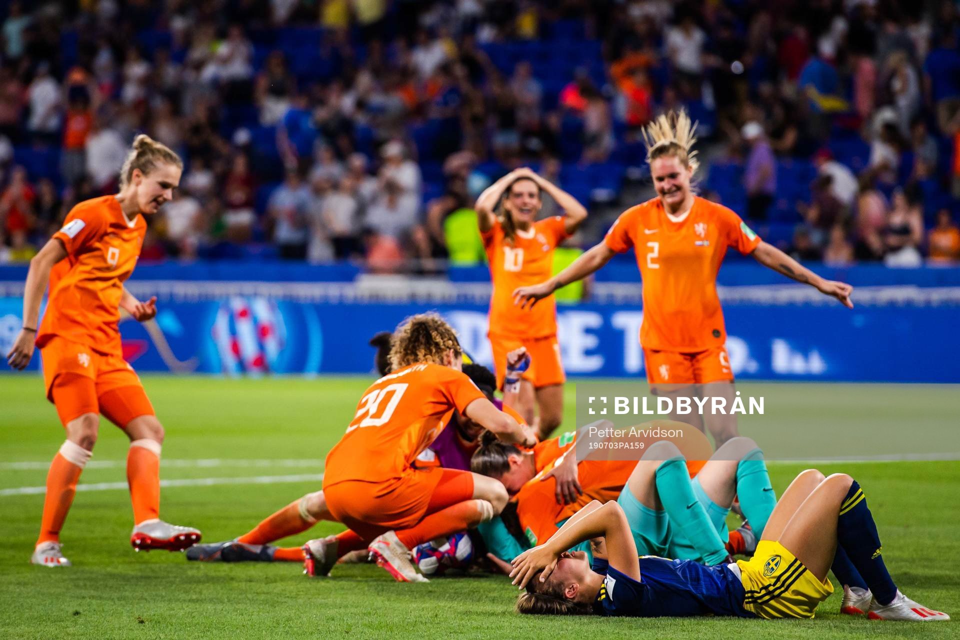 Julia Zigiotti Olme of Sweden looks dejected while players of Netherlands celebrate after the FIFA Women's World Cup semi-final match between Netherlands and Sweden on July 3, 2019 in Lyon.