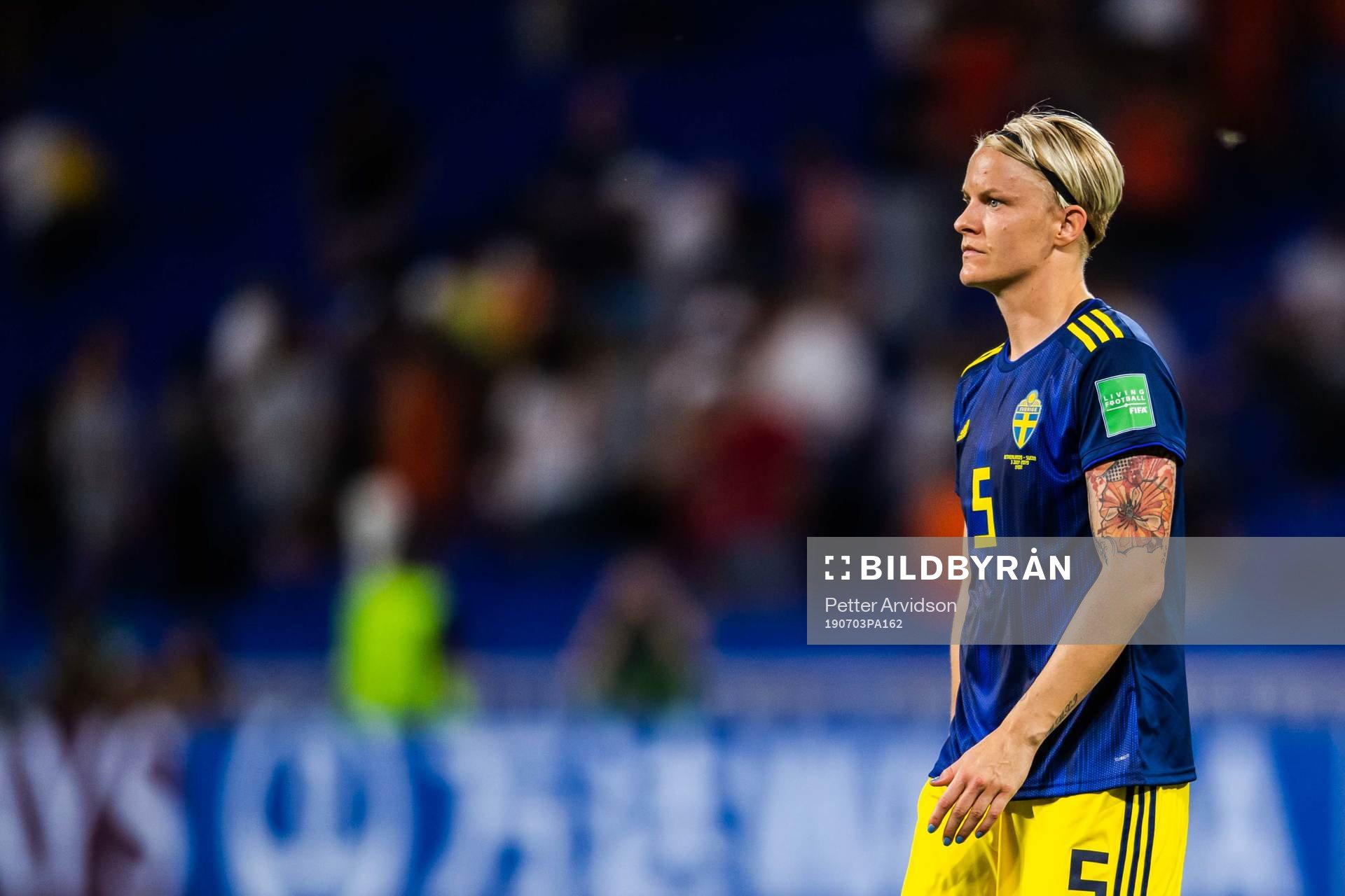 Nilla Fischer of Sweden looks dejected