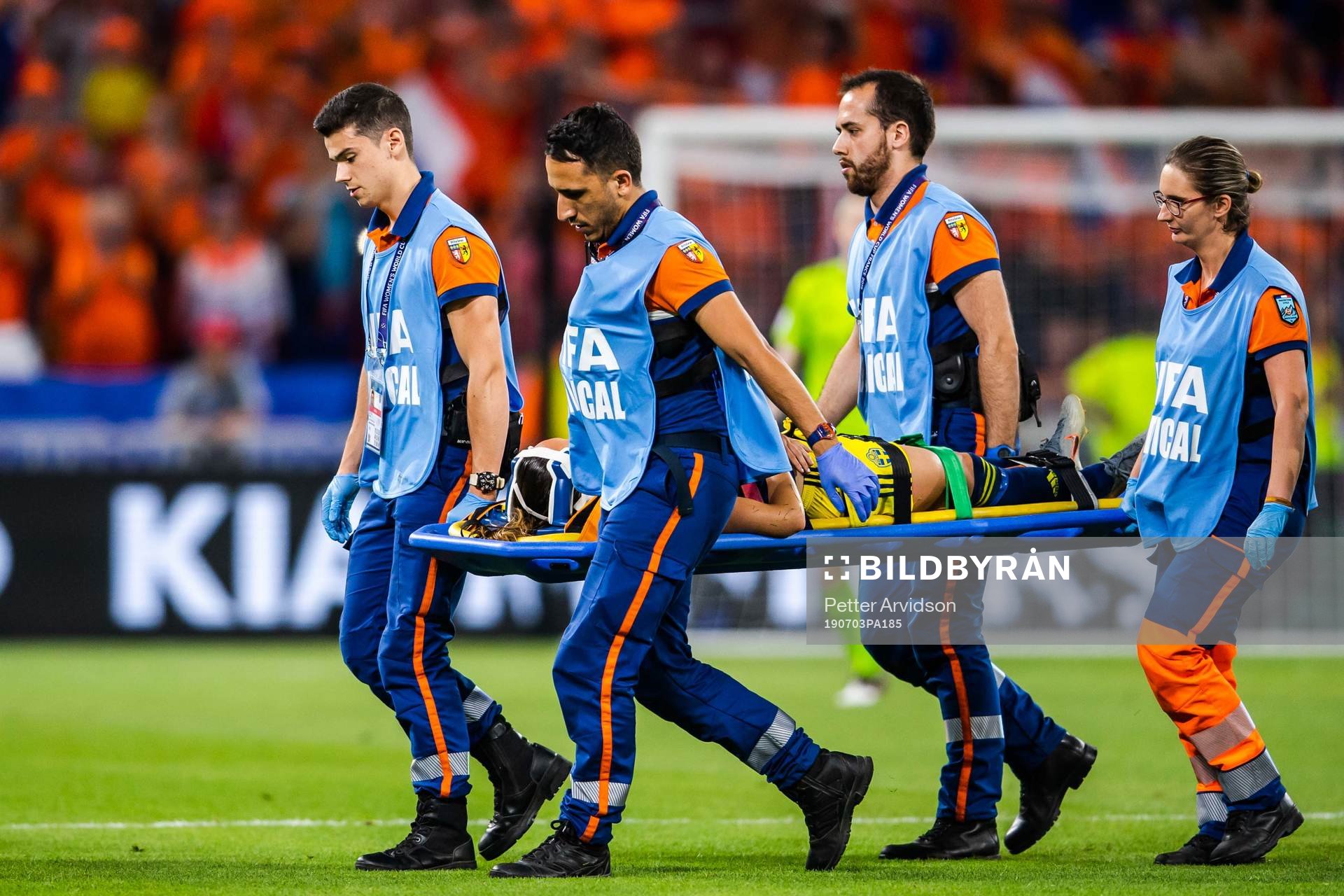 Kosovare Asllani of Sweden is carried of the pitch