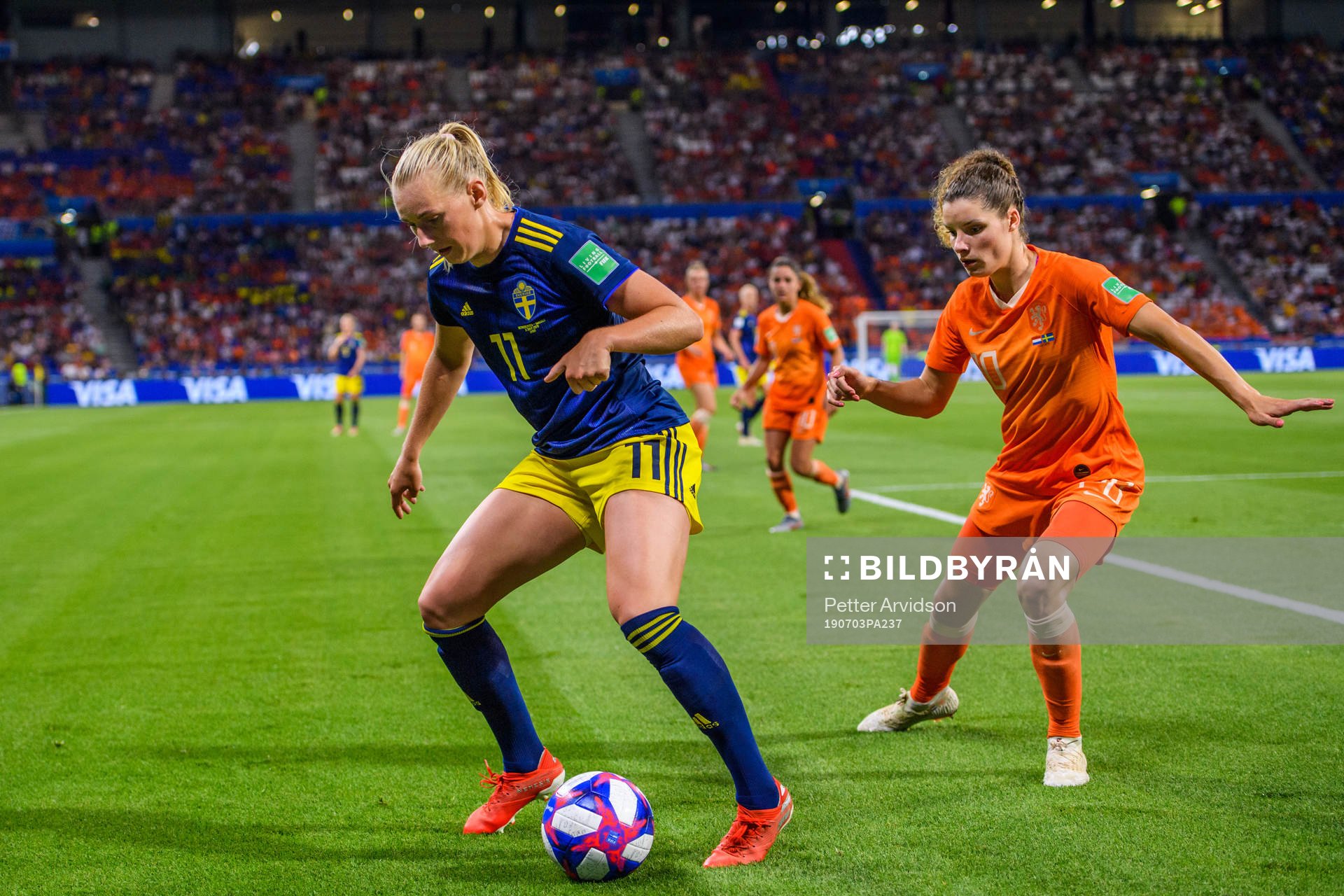 Stina Blackstenius of Sweden and Daniëlle Van De Donk of