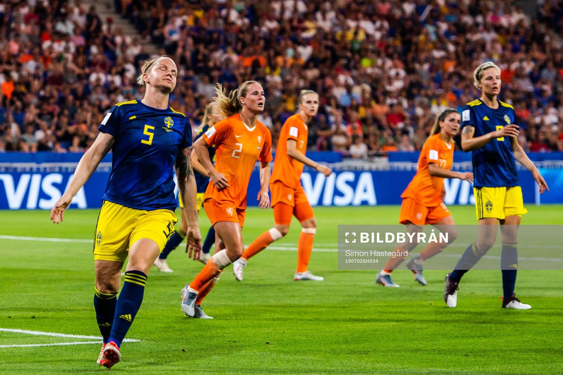 Nilla Fischer of Sweden looks dejected