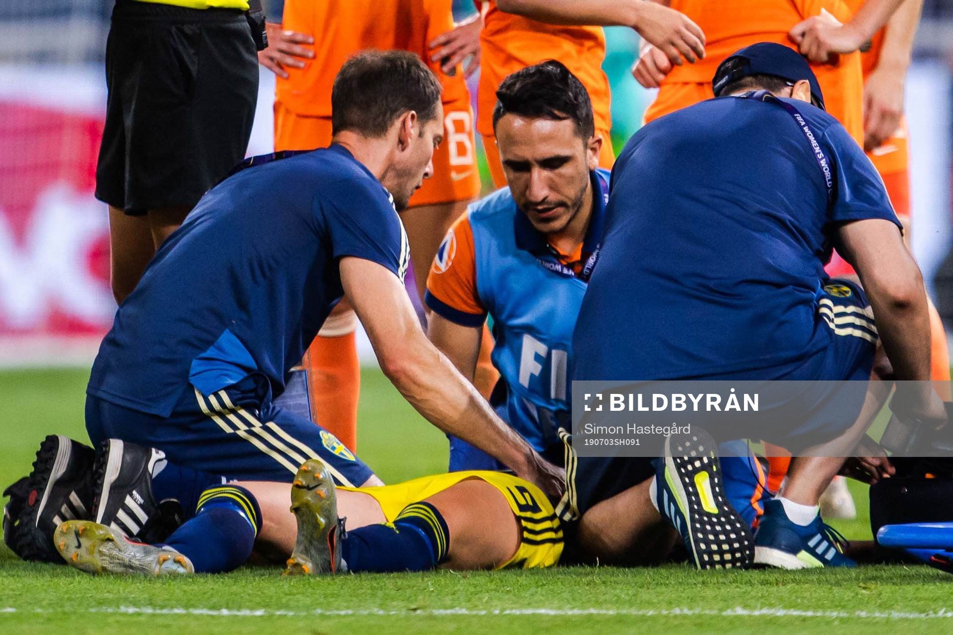 Kosovare Asllani of Sweden receives treatment