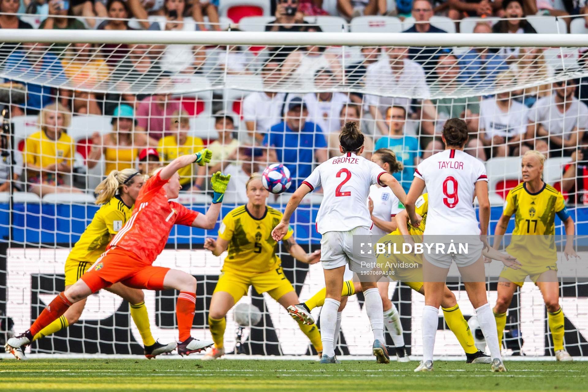 Nilla Fischer and goalkeeper Hedvig Lindahl of Sweden saves