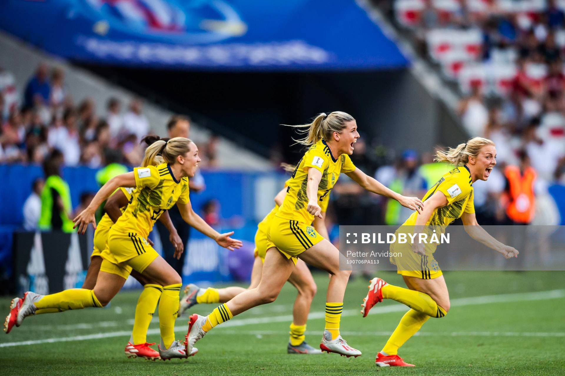 Substitutes of Sweden celebrate winning bronze