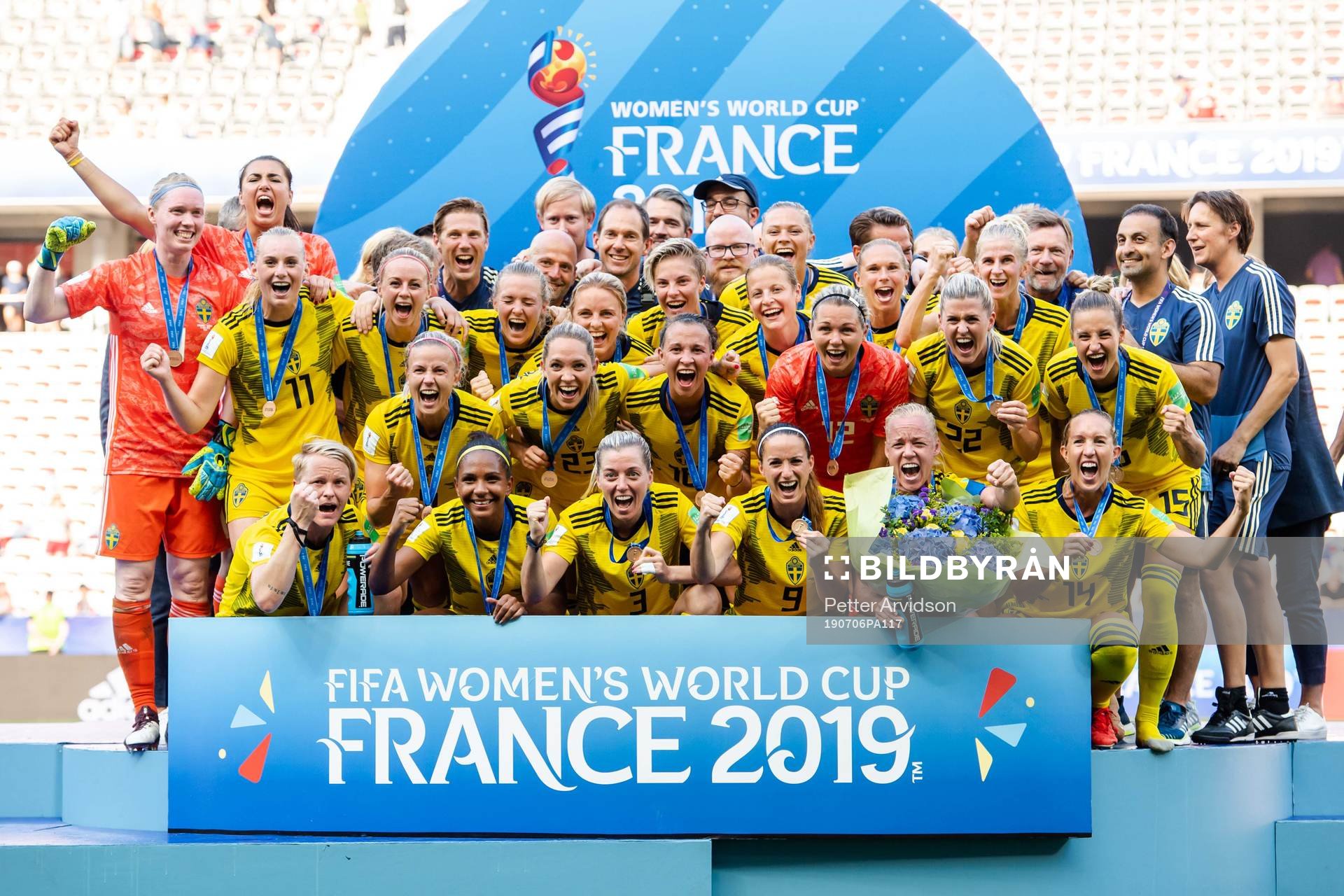 Players of Sweden celebrate with their bronze medals
