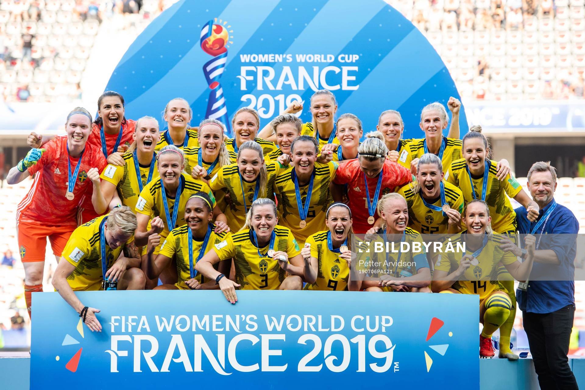 Players of Sweden celebrate with their bronze medals