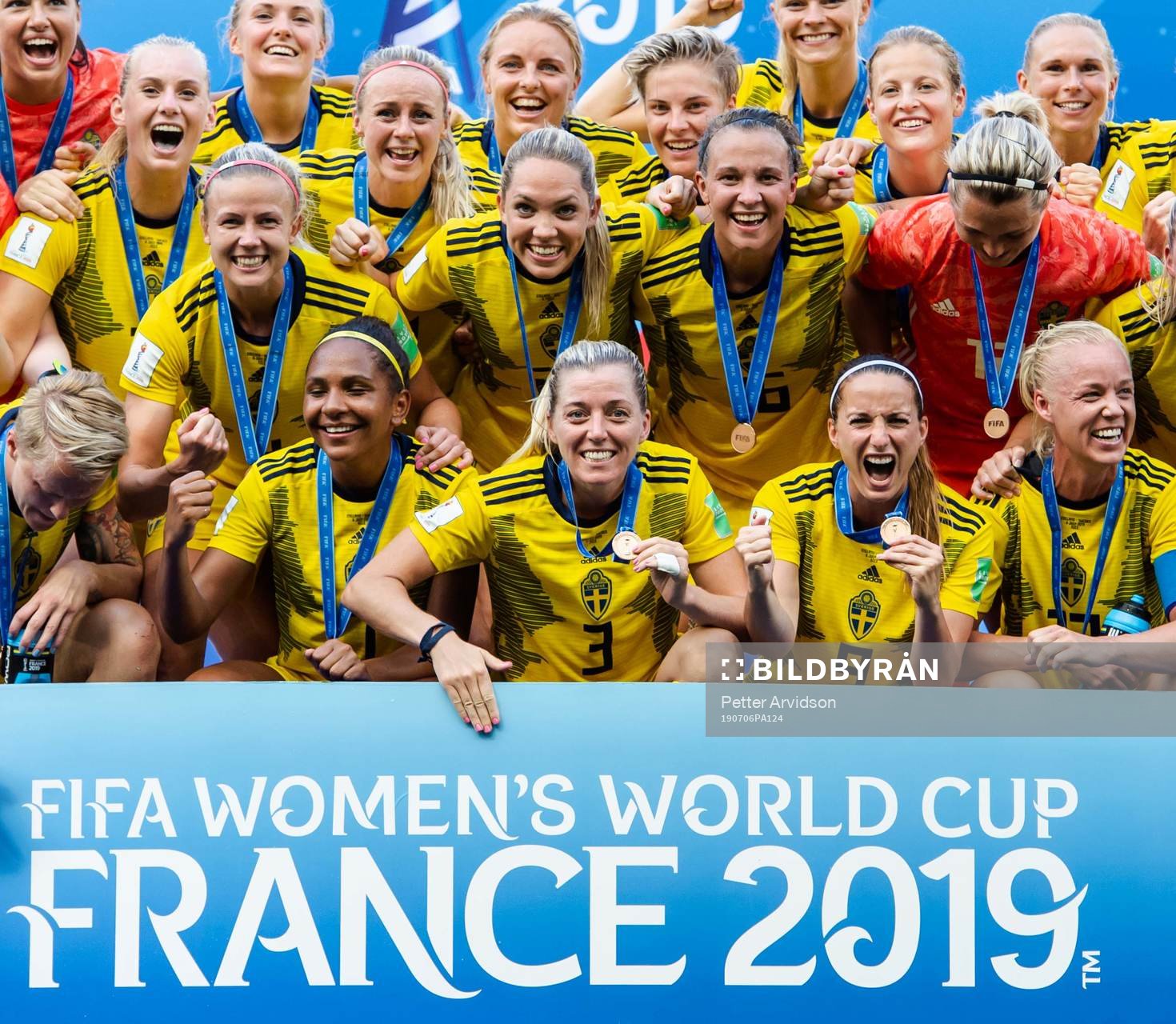 Players of Sweden celebrate with their bronze medals