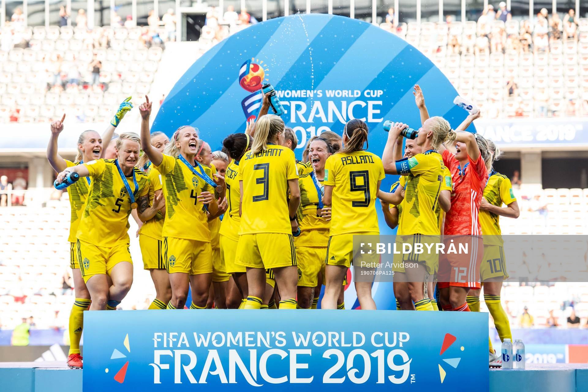 Players of Sweden celebrate with their bronze medals